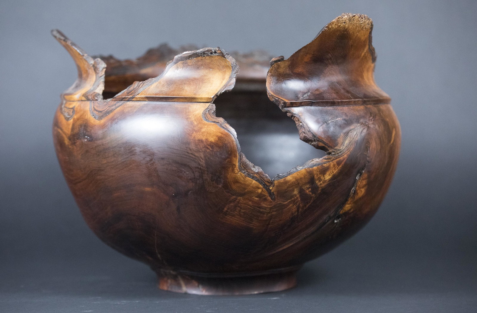 Large Walnut Burl Bowl: DESCRIPTION: Large walnut burl bowl. Signed Rick Murray to bottom. Dated '96. MEASUREMENTS: 16" diameter x 12" high. CONDITION: No defects noted.