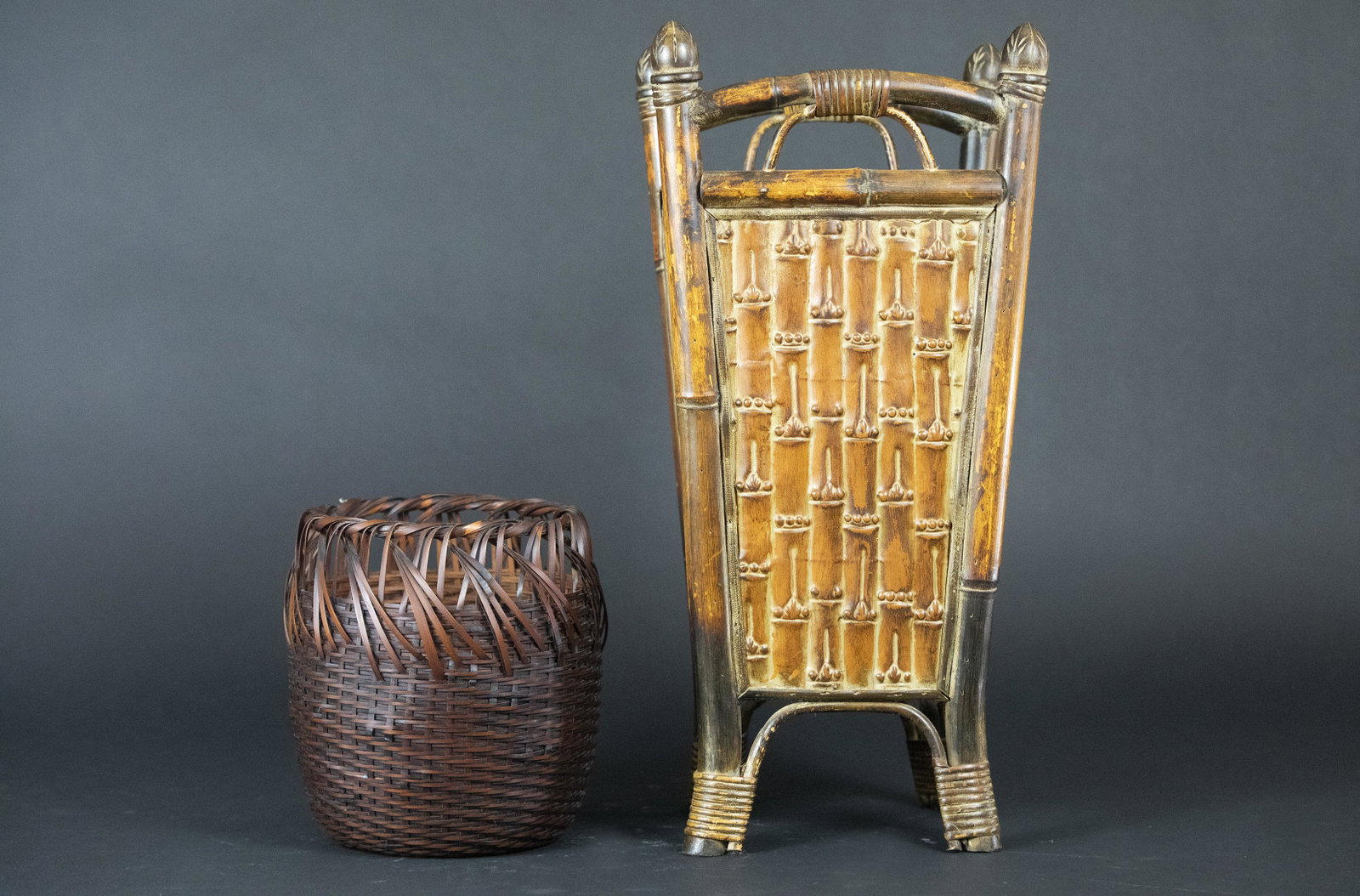 2 Asian Bamboo & Rattan Containers: DESCRIPTION: Two Asian bamboo and rattan containers. Includes bamboo and rattan umbrella stand and Japanese woven rattan basket. MEASUREMENTS: Umbrella stand: 8-1/2" x 19". Basket: 7" diameter x 8" hi