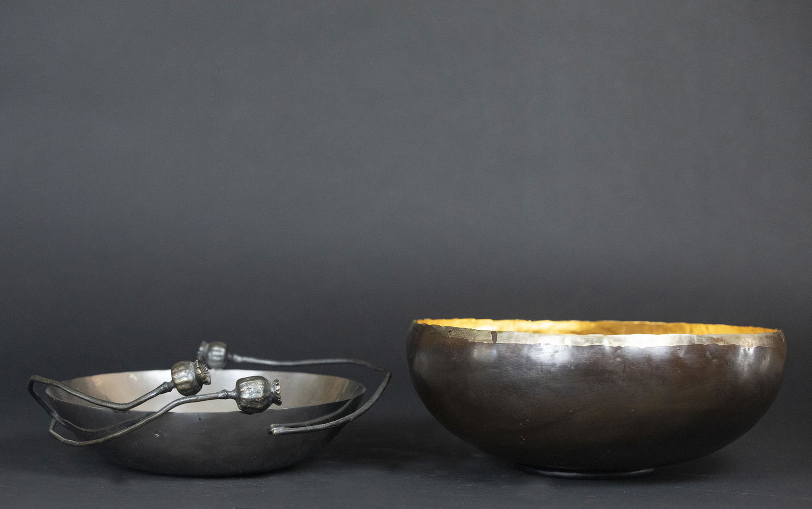 2 Michael Aram Mid Century Metal Bowls: DESCRIPTION: Two mid century metal bowls by Michael Aram. Includes: 1) Stainless steel bowl with applied bronze poppies. 10" diameter. 2) Gold washed bronze finished bowl. Signed to bottom. 12" diamet