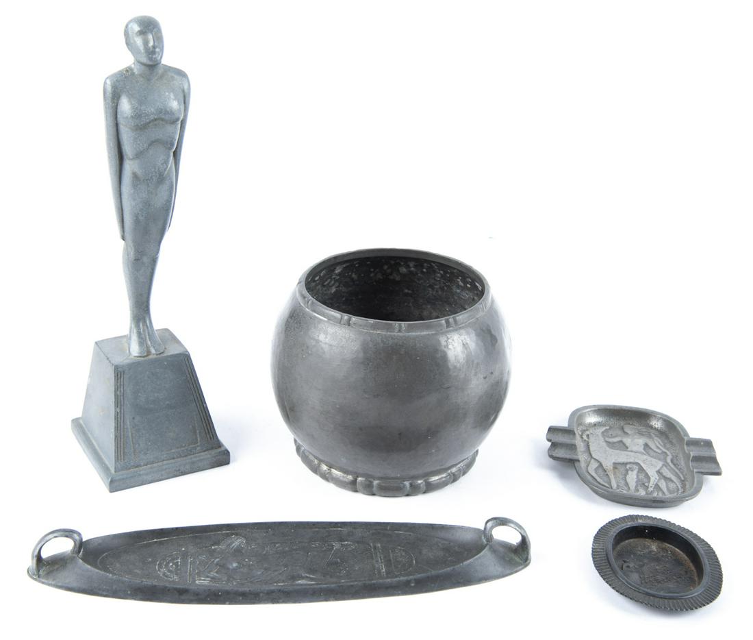 5 Pc Pewter Grouping: DESCRIPTION: Five piece pewter grouping. Include 10-1/2" oval tray with classical nude louging scene to center, 10-3/4" figural trophy, 4-1/2" x 4-1/2" man and beast ash tray with cigarette holders, 2