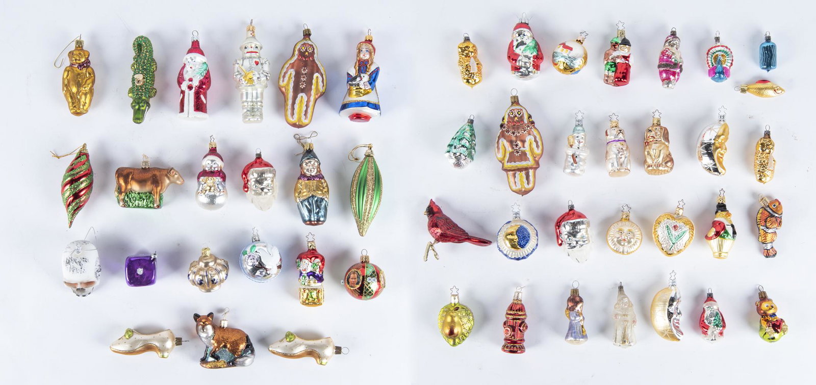 50 Blown Glass Ornaments incl Christopher Radko: DESCRIPTION: Fifty misc. blown glass ornaments including Christopher Radko. Subjects include Santa, animals, skull, angels, snowmen, Star Trek, gingerbread man, and more. MEASUREMENTS: 2" to 6" high. 