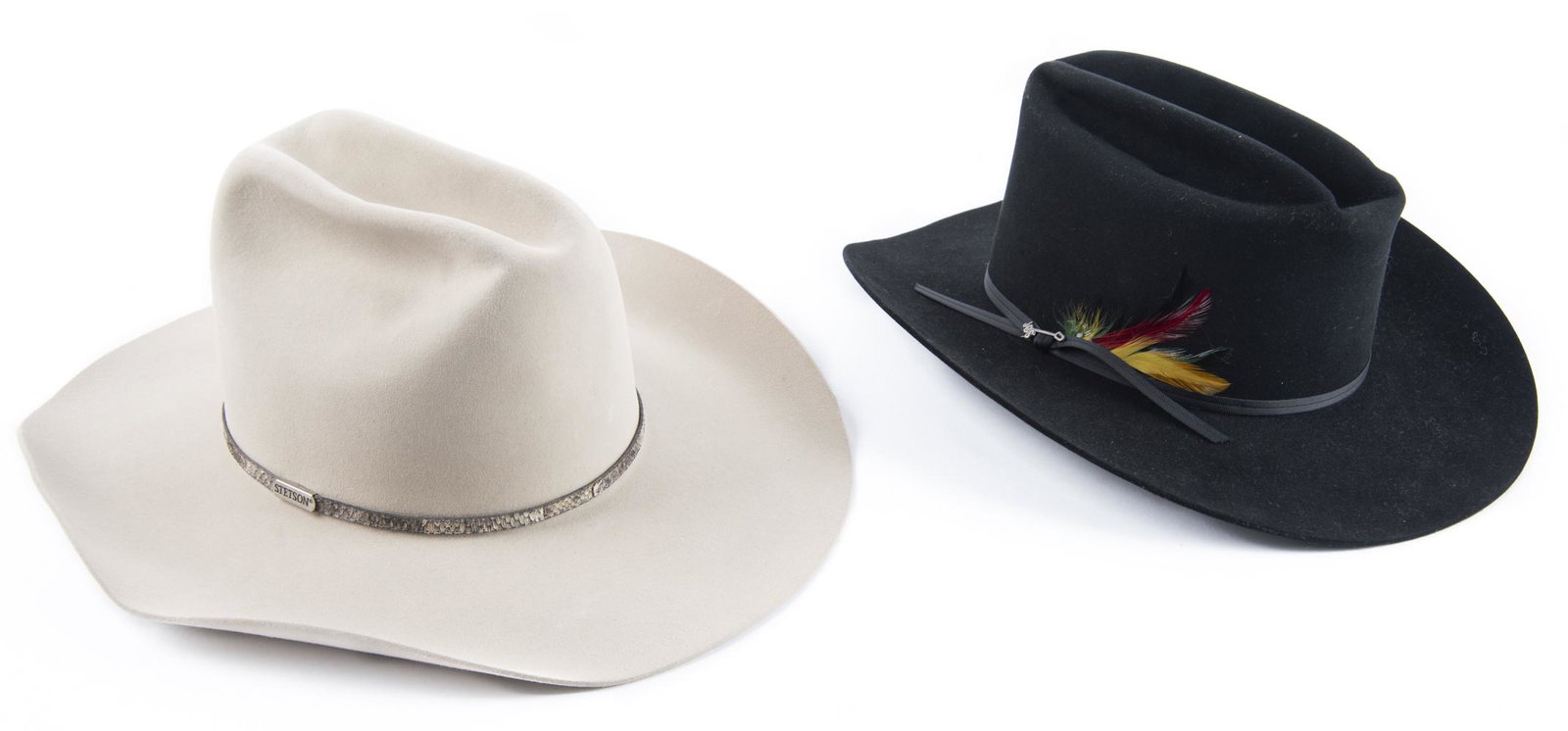 Two Beaver Stetson Hats, Black and Natural: DESCRIPTION: Two Stetson hats. One black beaver with feathers and "JBS" pin, size 7-1/8. One natural beaver with snakeskin band size 7-1/4 in original box. MEASUREMENTS: See Description. CONDITION: As