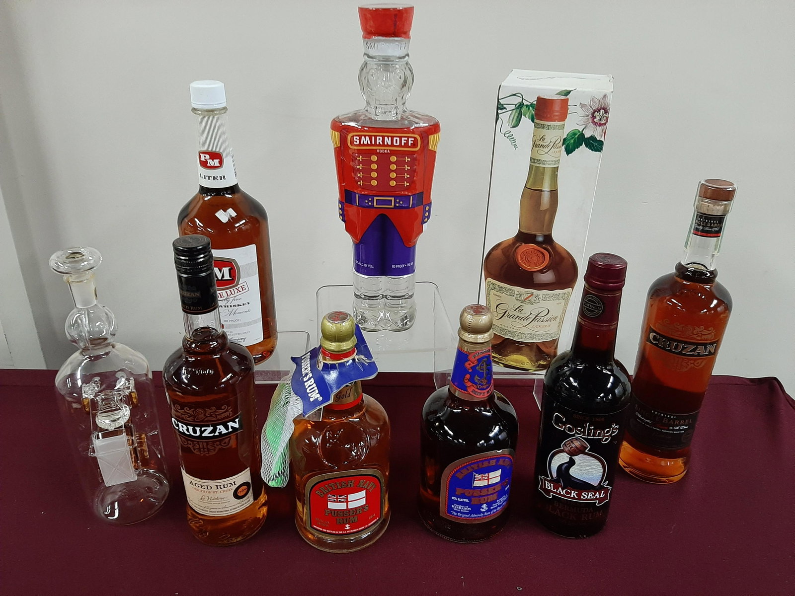8 Bottles Estate Alcohol: All factory sealed and unopened. Cannot be shipped. Also includes glass car in a bottle.