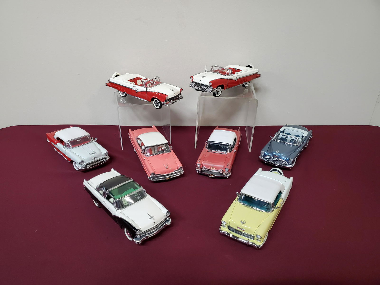 8 Danbury Mint Die Cast Cars: 1:24 scale. Some with detached pieces.