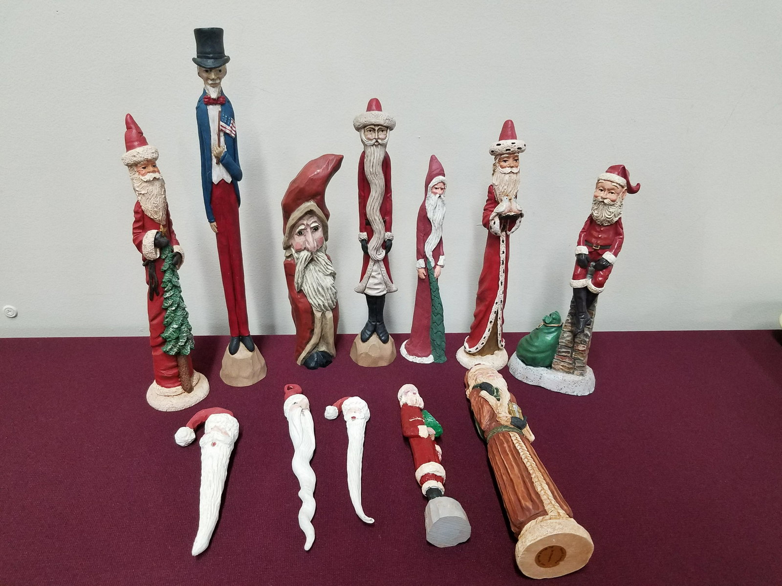 11 Pencil Santa Figurines: Also includes one Uncle Sam. 5" to 10-3/4" high.