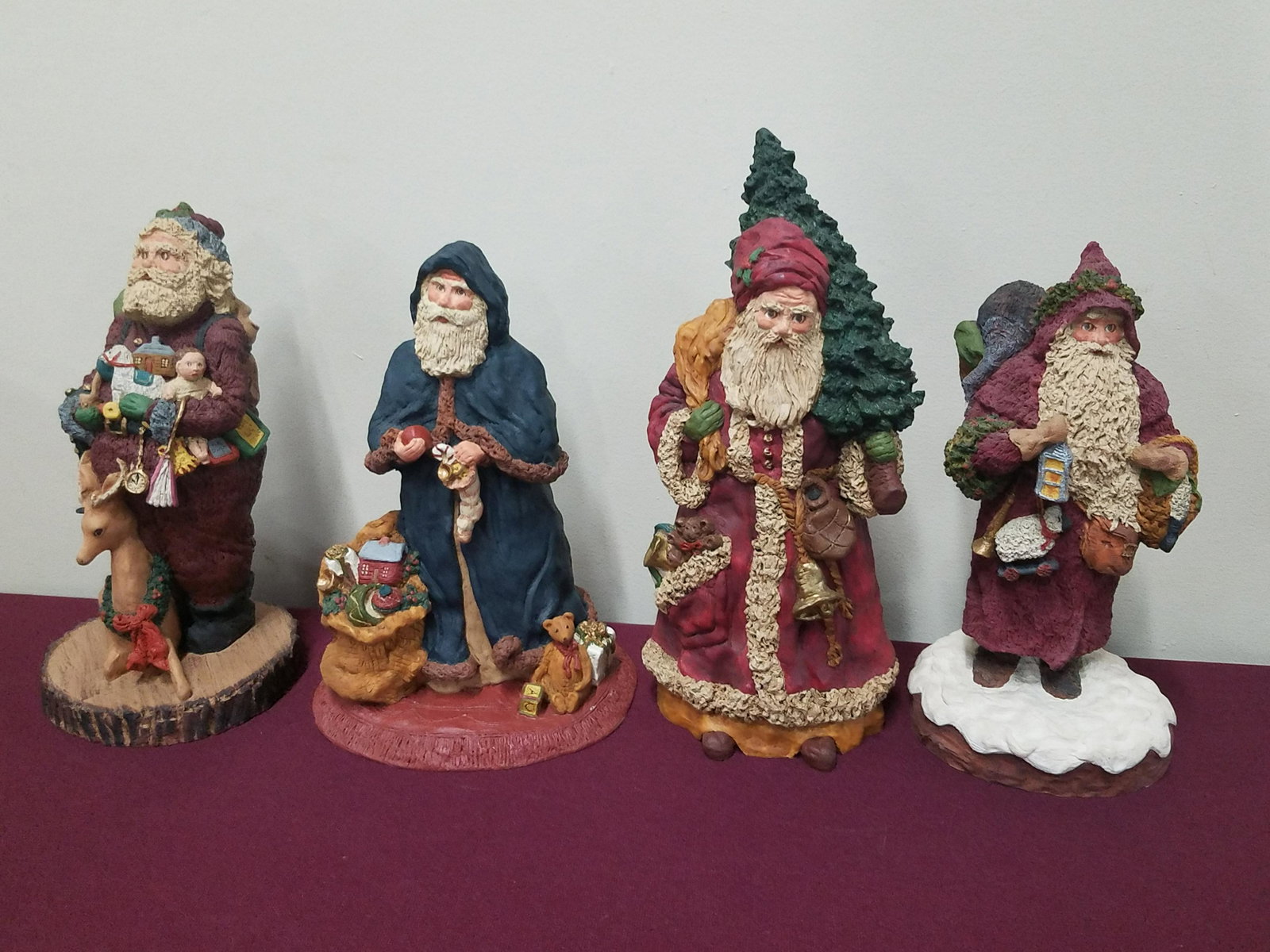 4 June McKenna Santa Figurines: 9-3/4" to 10-1/2" high. All signed.