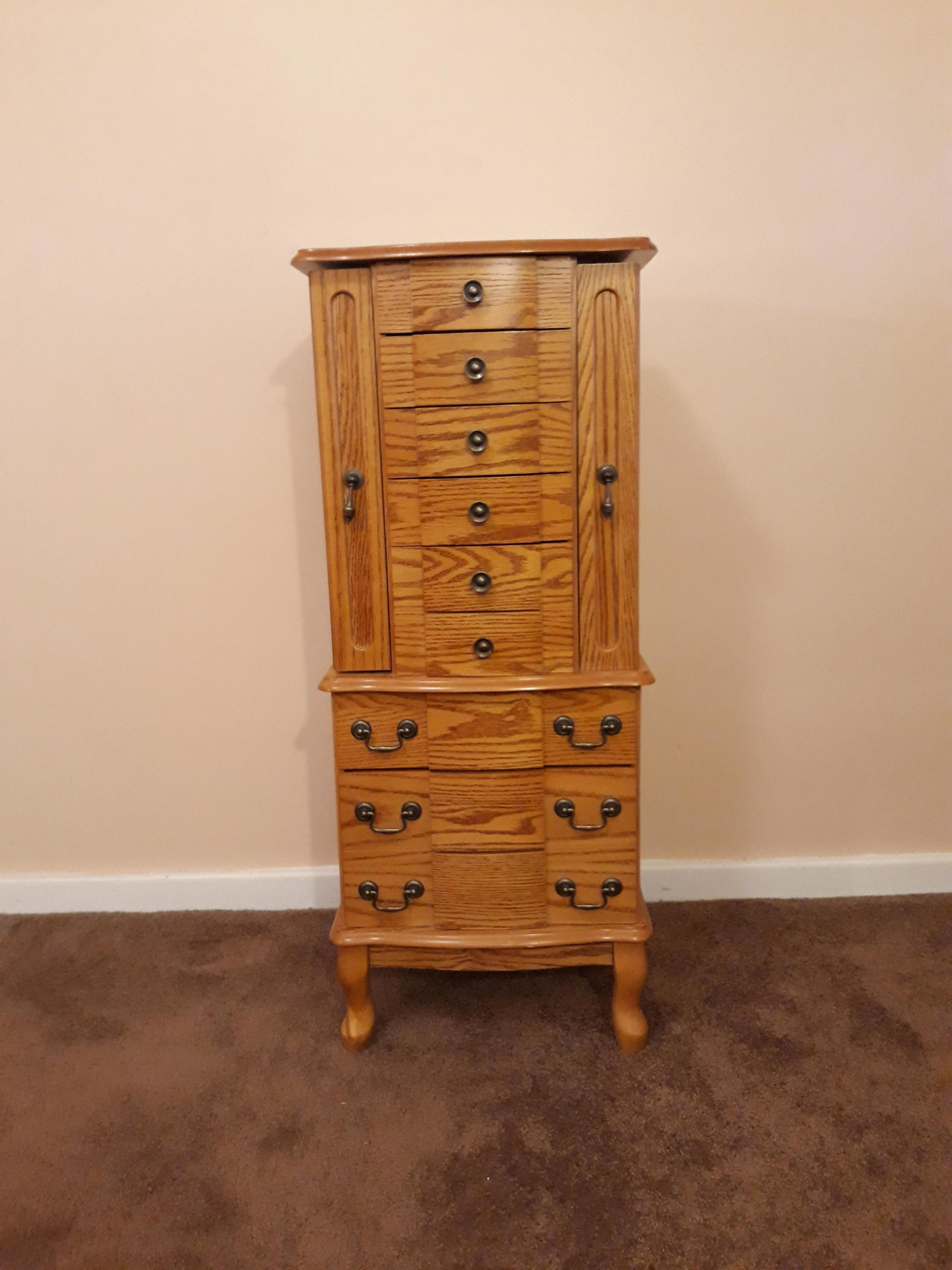 Oak Jewelry Armor: 7 drawers, 2 doors, and lift top. 17" wide x 41-1/2" high.