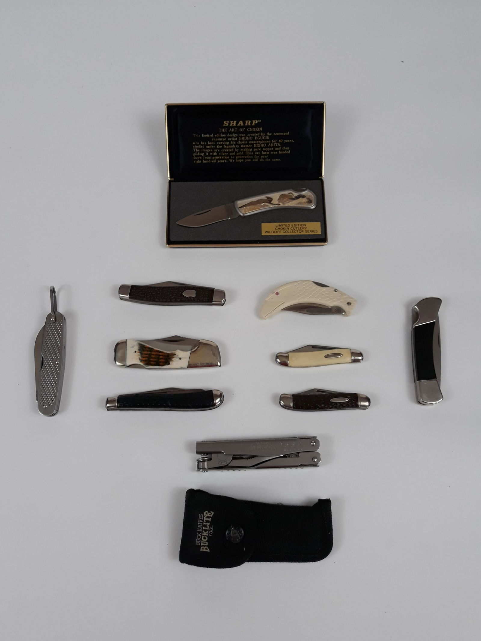 9 Folding Knives incl Buck and Sharp: Includes Sharp ltd. ed Chokin Cutlery Wildlife Collector Series in case, Buck knives Bucklite tool in case, Sabre, 3 Imperial Ireland, Towika Ireland, carved eagle handle, Frost Cutlery bone handles,