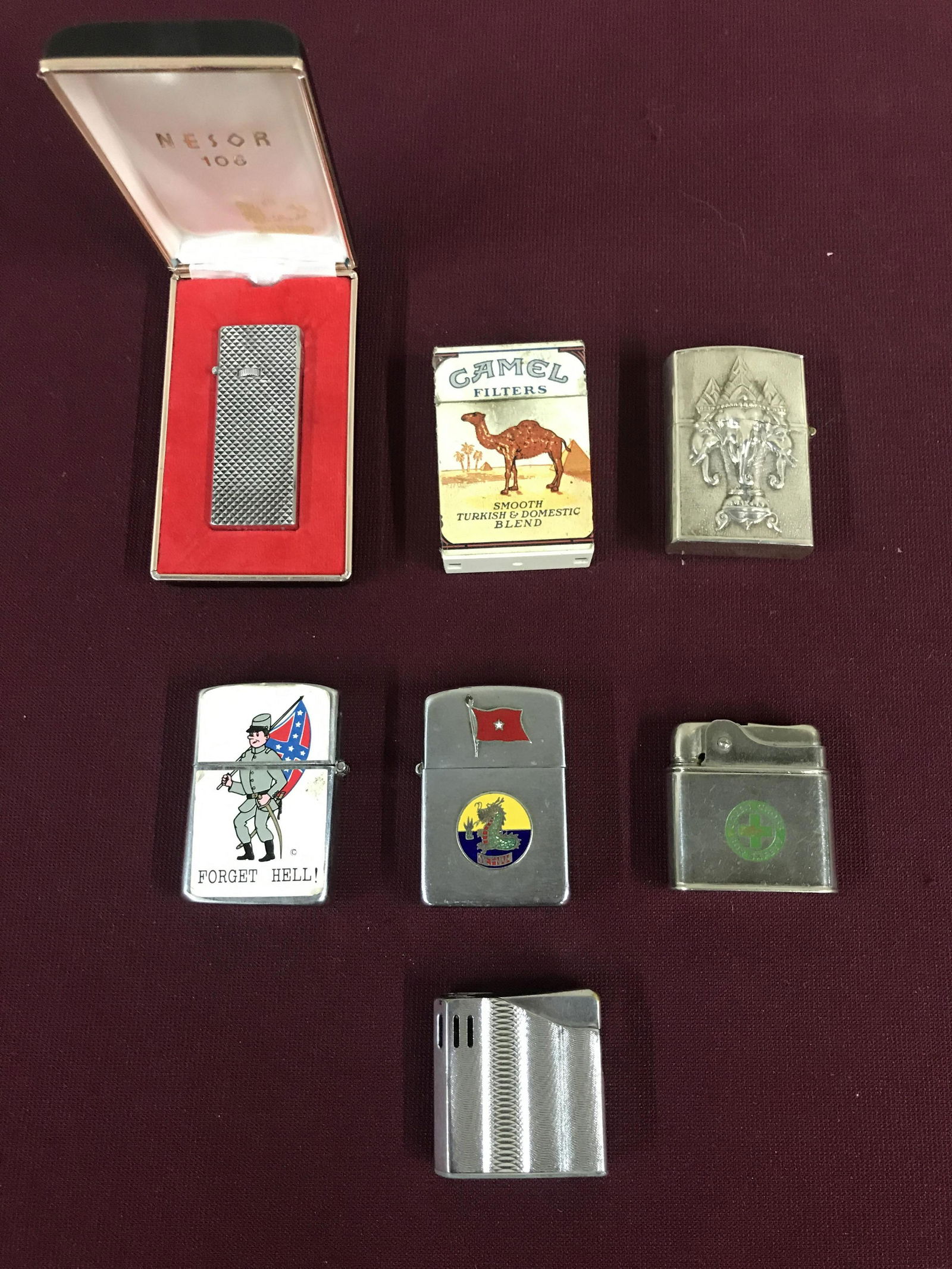 7 Lighters incl Presentation: Vietnam Presentation to B. Gen. Lee Dong Yong CG 2nd ROK MAR BDE with enamel dragon and flag decoration manufactured by Sunmy, Green Cross for safety Berlin Command 1 Year Safe Driver Award manufactur