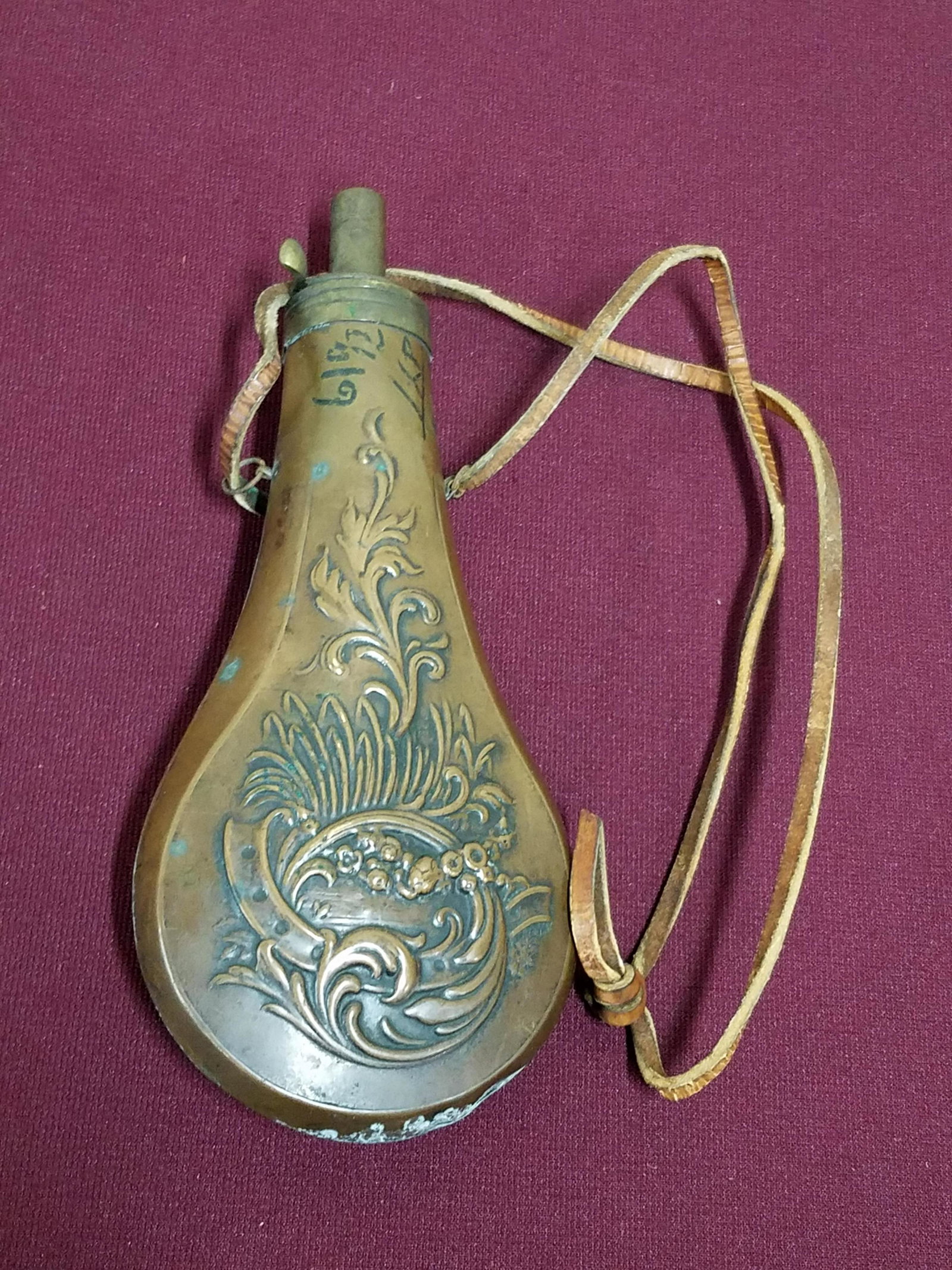 Powder Flask: 4" wide x 8-3/4" long.