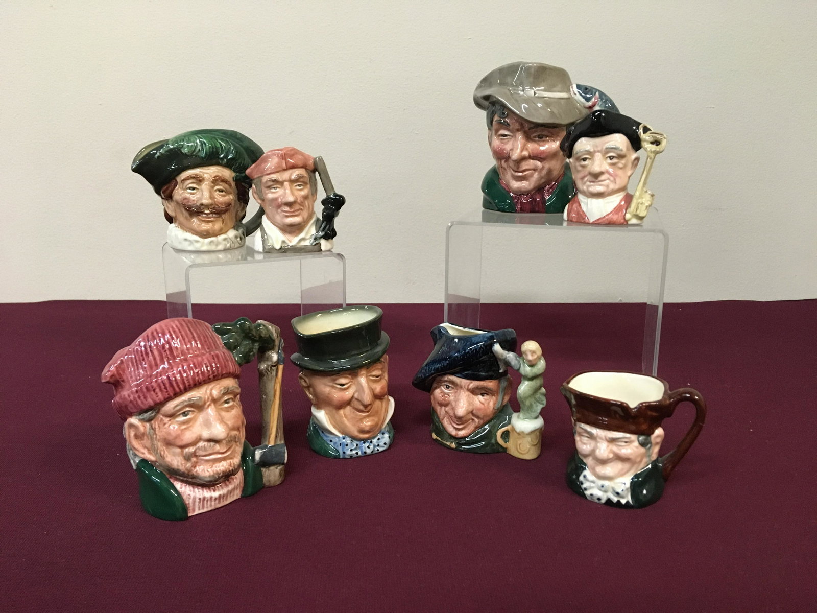 8 Miniature Royal Doulton Toby Mugs: From 2-1/8 to 4 high.