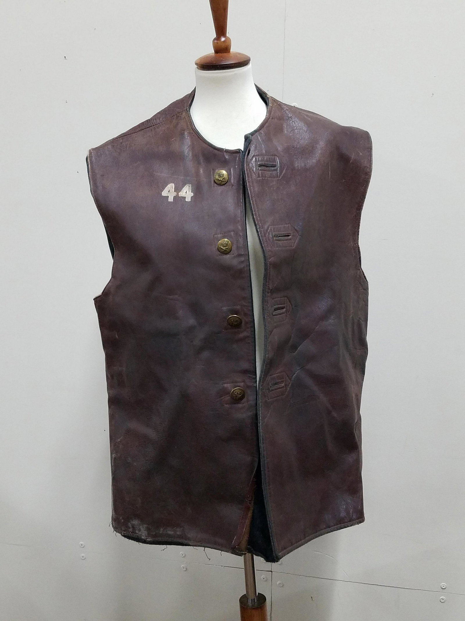 Leather Vest: Shoulder width 19-1/2" x 32-1/2" long. Some wear.
