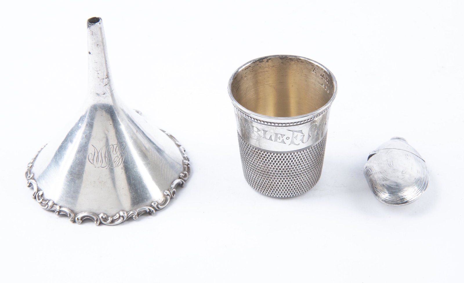 3 Pcs Misc Sterling: DESCRIPTION: Three pieces misc sterling. Includes: 1) 3" Monogrammed Wallace funnel. 2) 2" Simon Brothers thimble. Engraved "Only A Thimble" to front and "EJH & CEH 1938-1963" to inside. 3) 2" Hinged 