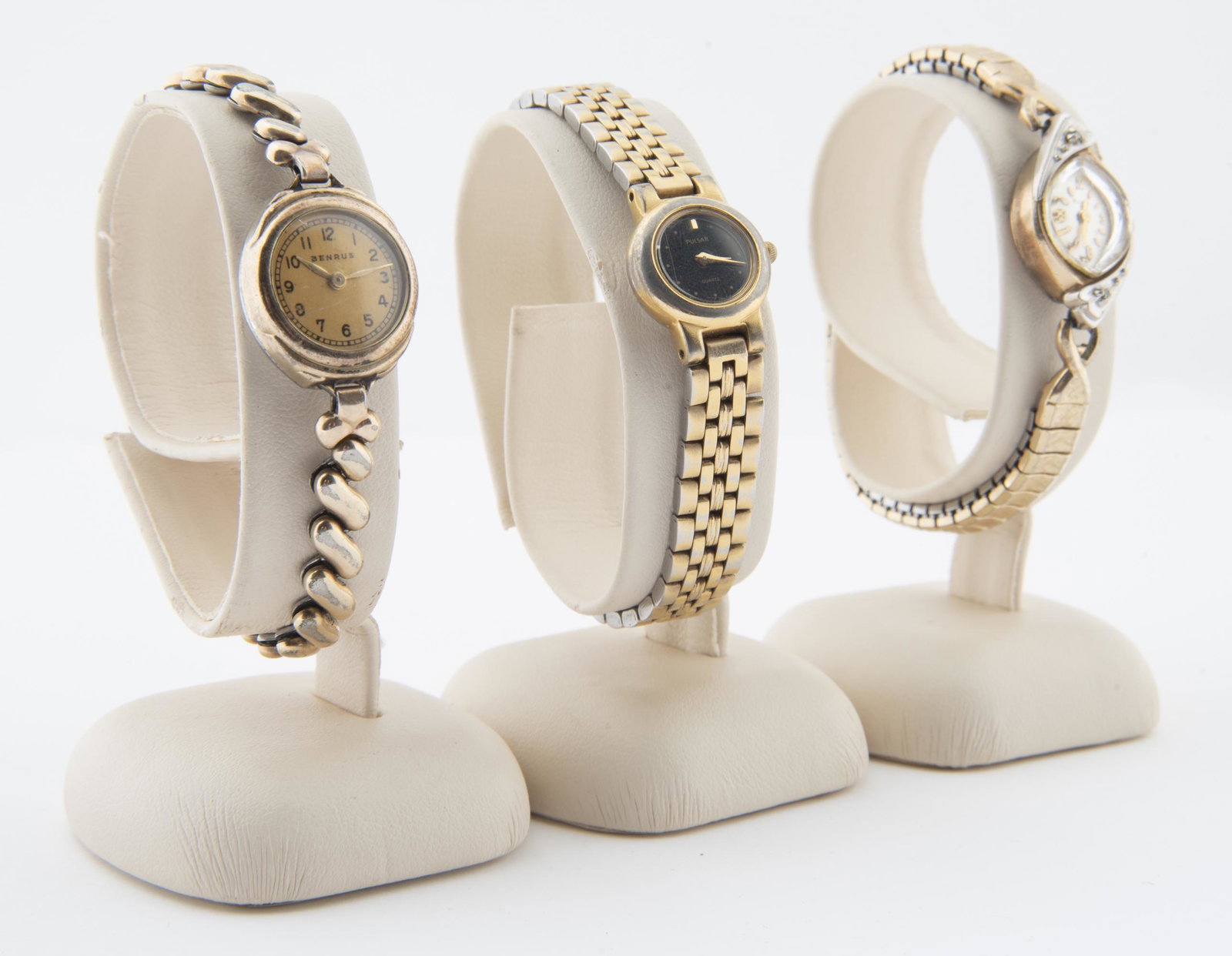 3 Wrist Watches incl Bulova: DESCRIPTION: Three wrist watches. Includes: 1) Vintage Bulova seventeen jewels. 14k rolled gold plate case with two diamonds. 1" lug to lug. Running. 2) Vintage Benrus seventeen jewels. 1" lug to lug.