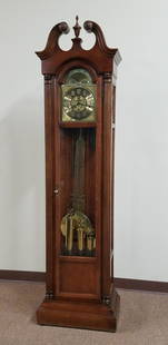 Howard Miller Tall Case Clock: In working order. 21-1/4" wide x 12-1/4" deep x 79-1/4" high.