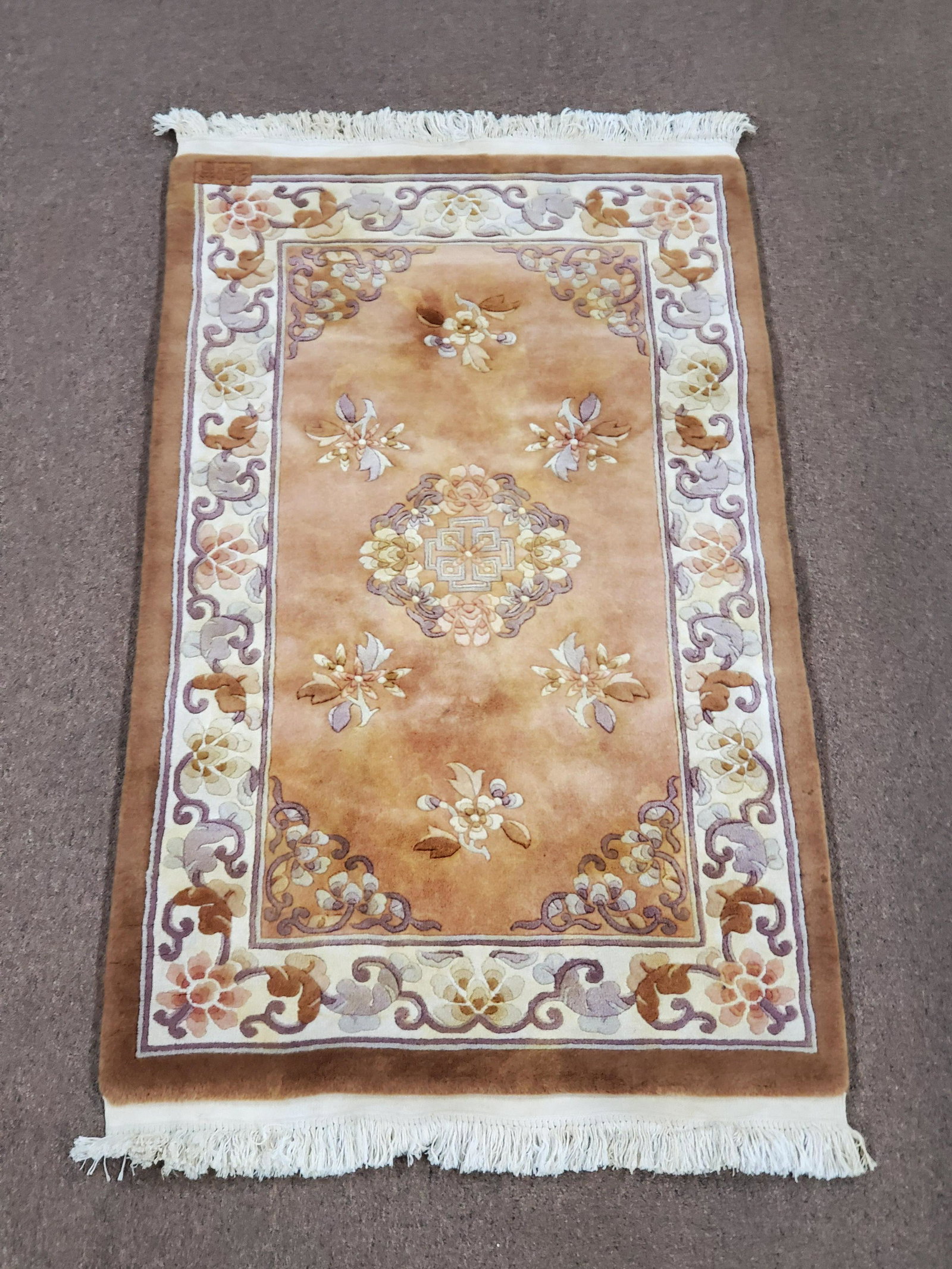 Area Rug: 5' 3" long x 3' wide. Hand Woven.