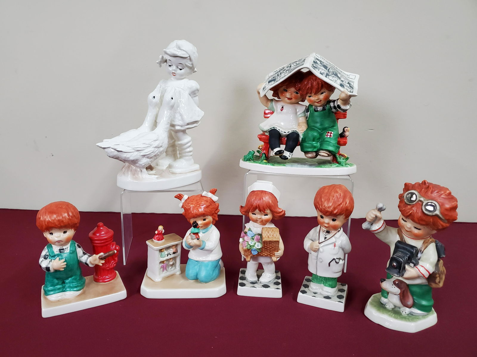 7 Pcs Goebel Figurines: Various bee stamps. 4" to 7-1/2" high.