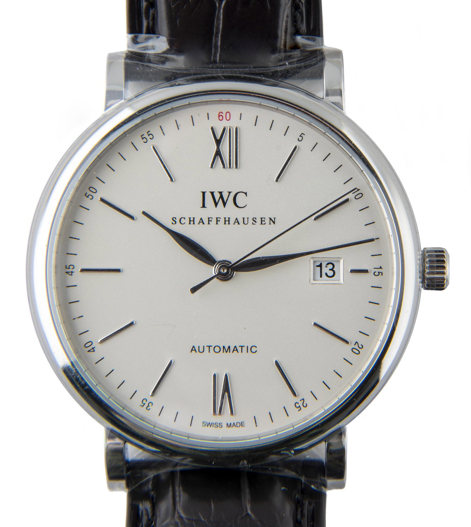 IWC Schaffhausen Portofino Men's Wrist Watch MIB: DESCRIPTION: IWC Schaffhausen Portofino Automatic 37 men's wrist watch. New in original box. Serial number 5743599, 907/1000. Features 25-jewels, stainless steel case, leather band, sapphire crystal, 