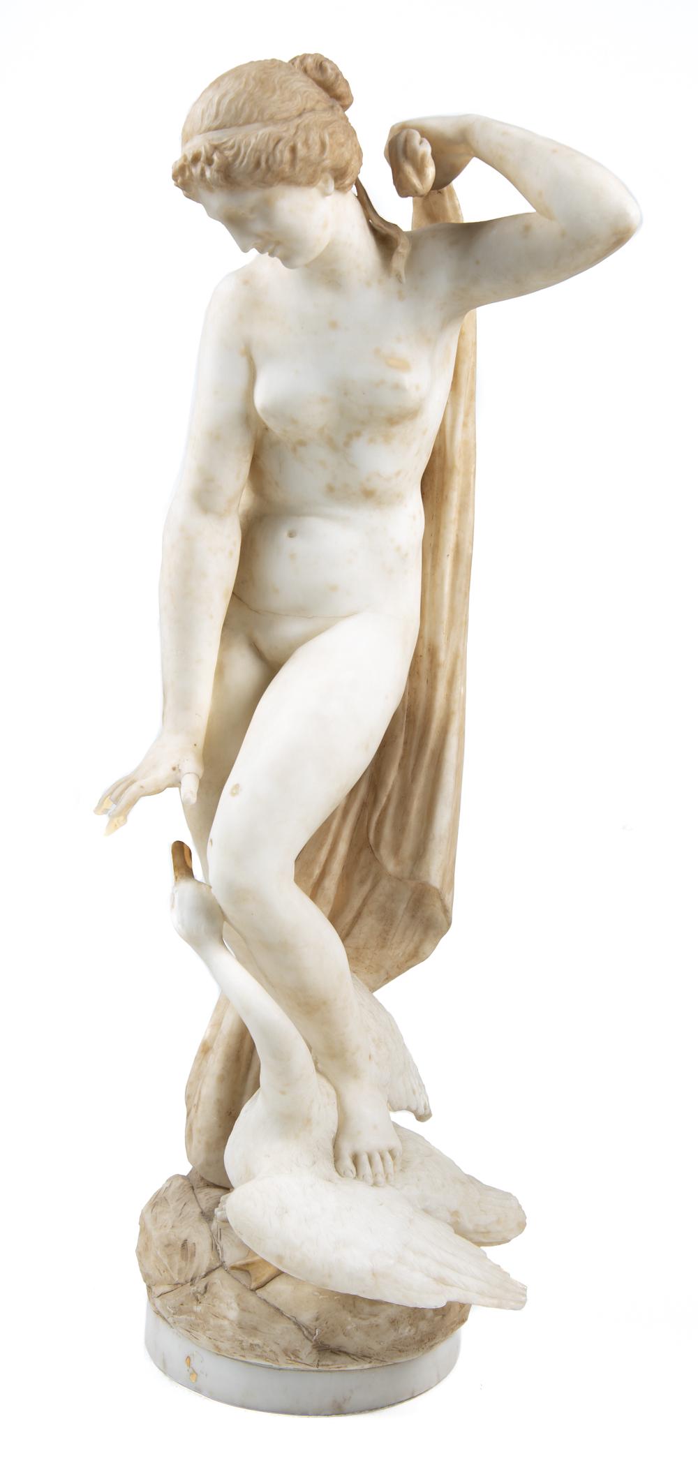 Italian Leda and The Swan Alabaster Sculpture: DESCRIPTION: Italian alabaster sculpture of Leda and The Swan. Designed by A. Masoni. Figure of Leda with darkened hair and garment standing with a swan at her side with one foot resting on the swan. 