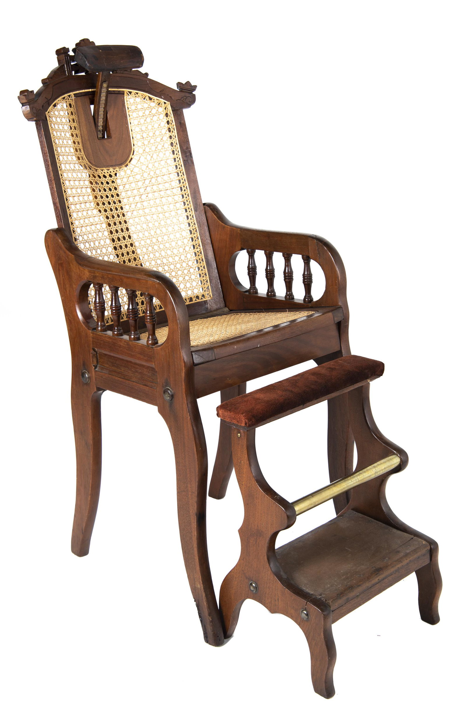 Joseph Clough Dentist/Barber Chair, Late 19th C.: DESCRIPTION: Joseph Clough dentist/barber chair with footstool. Plaqued to back with 1877 and 1878 patent dates. Bracket with lock at back to recline seat. Adjustable headrest. MEASUREMENTS: Seat upri