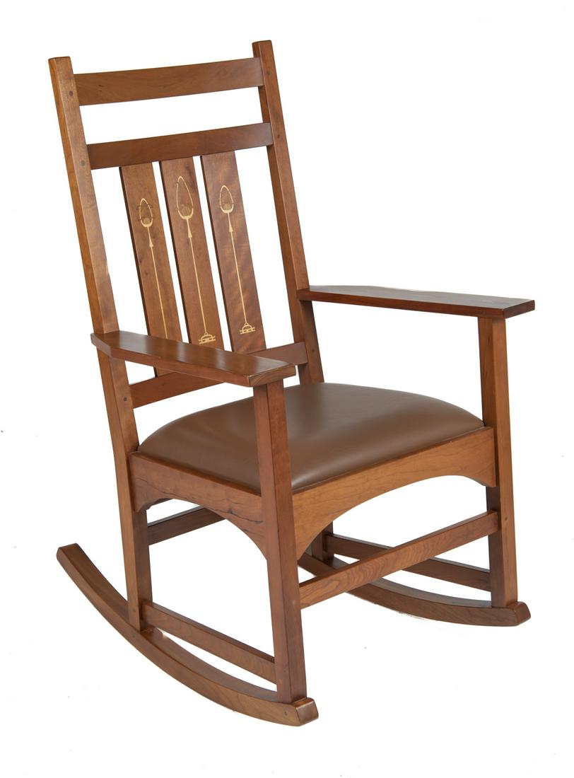 Harvey Ellis Stickley Mission Inlaid Rocker: DESCRIPTION: Contemporary Harvey Ellis Stickley mission cherry rocking chair. With leather upholstered seat and inlay decoration to vertical back slats. Labeled to bottom. MEASUREMENTS: 25-3/4" wide x