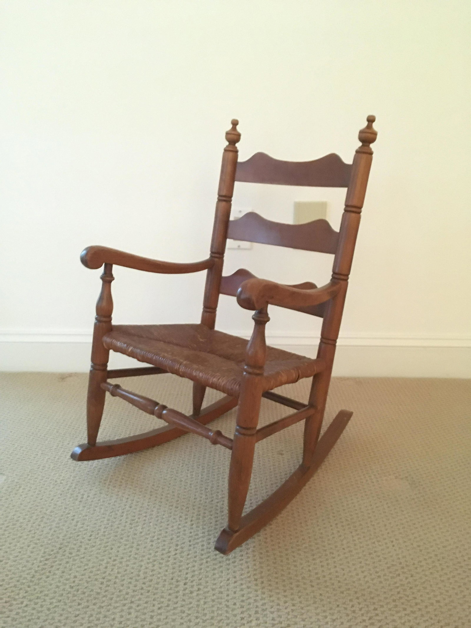 Antique Childs Rocking Chair: 27 high x 16 wide x 22 deep.