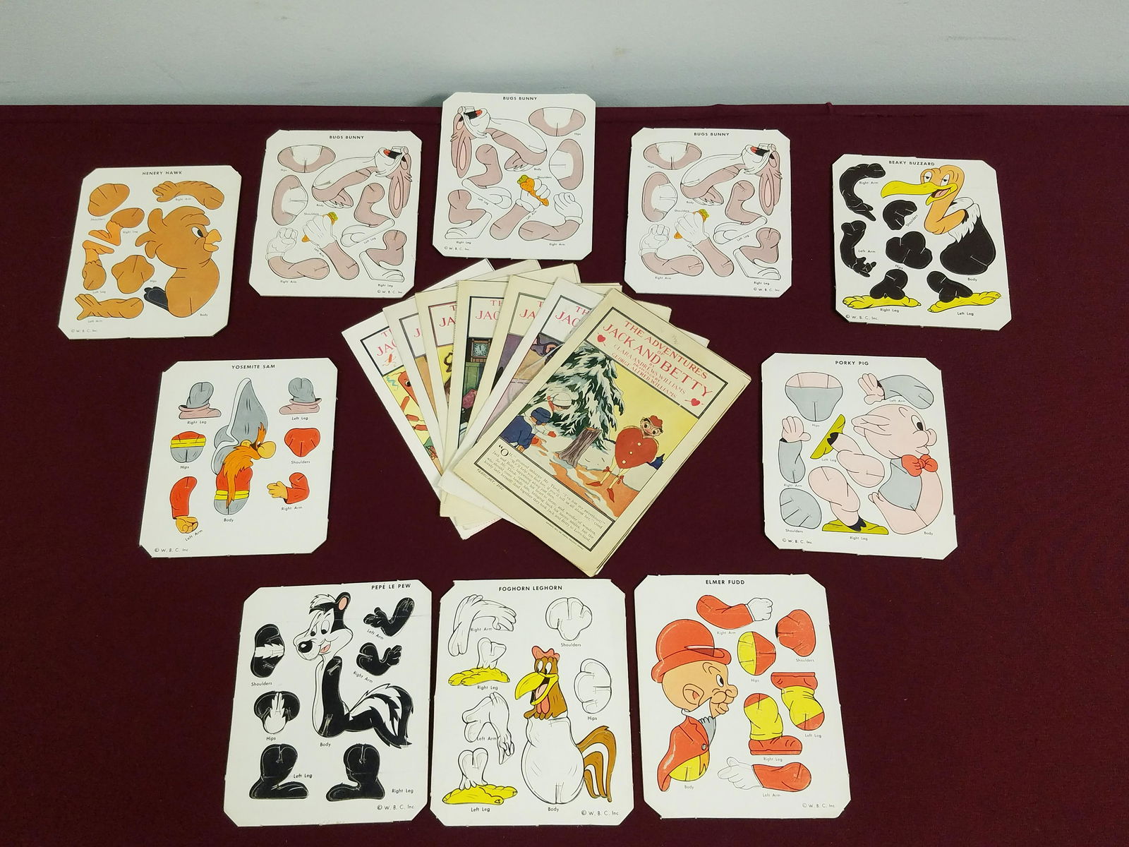 7-1912 Adventure Jack and Betty and 10 Figures: Includes seven The Adventures of Jack and Betty by Clara Andrews Williams and drawings by George Alfred Williams. Also includes 10 Warner Brothers cardboard animated figures including Bugs Bunny, Beak