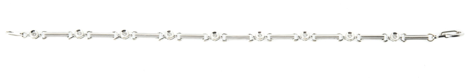 14k White Gold Diamond Bracelet: DESCRIPTION: 14K white gold diamond bracelet. MEASUREMENTS: 6-1/2" length. 3.7 dwt.
