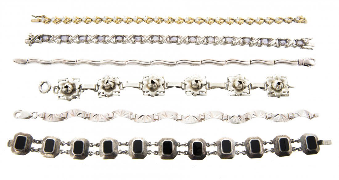 6 Sterling Link Bracelets: DESCRIPTION: Six sterling link bracelets. MEASUREMENTS: 5-1/2" to 7".