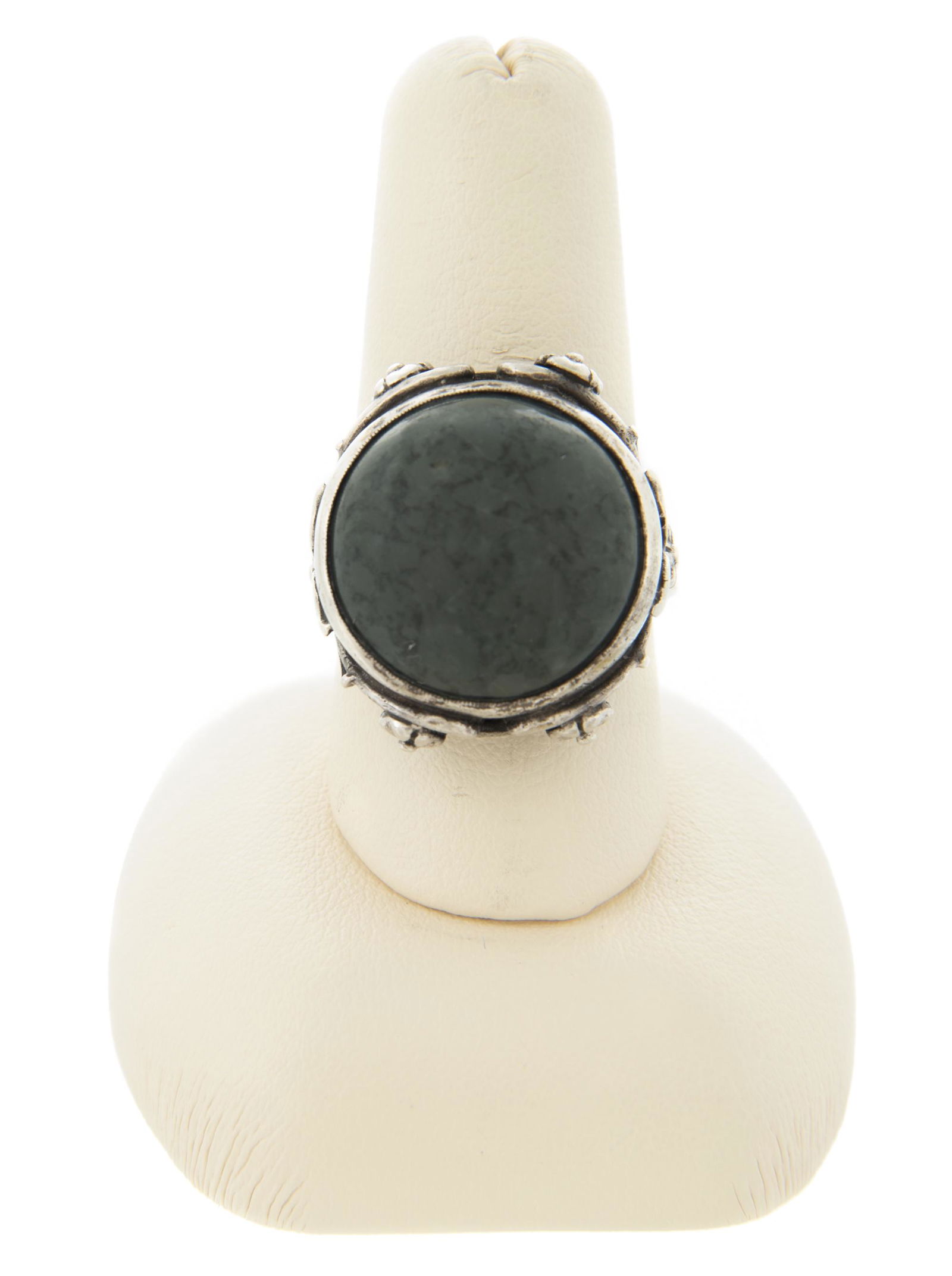 Chinese Antique Jade Dome Ring: DESCRIPTION: Chinese dome ring. Jade cabochon. MEASUREMENTS: Size 8.25. Cabochon 18mm diameter.