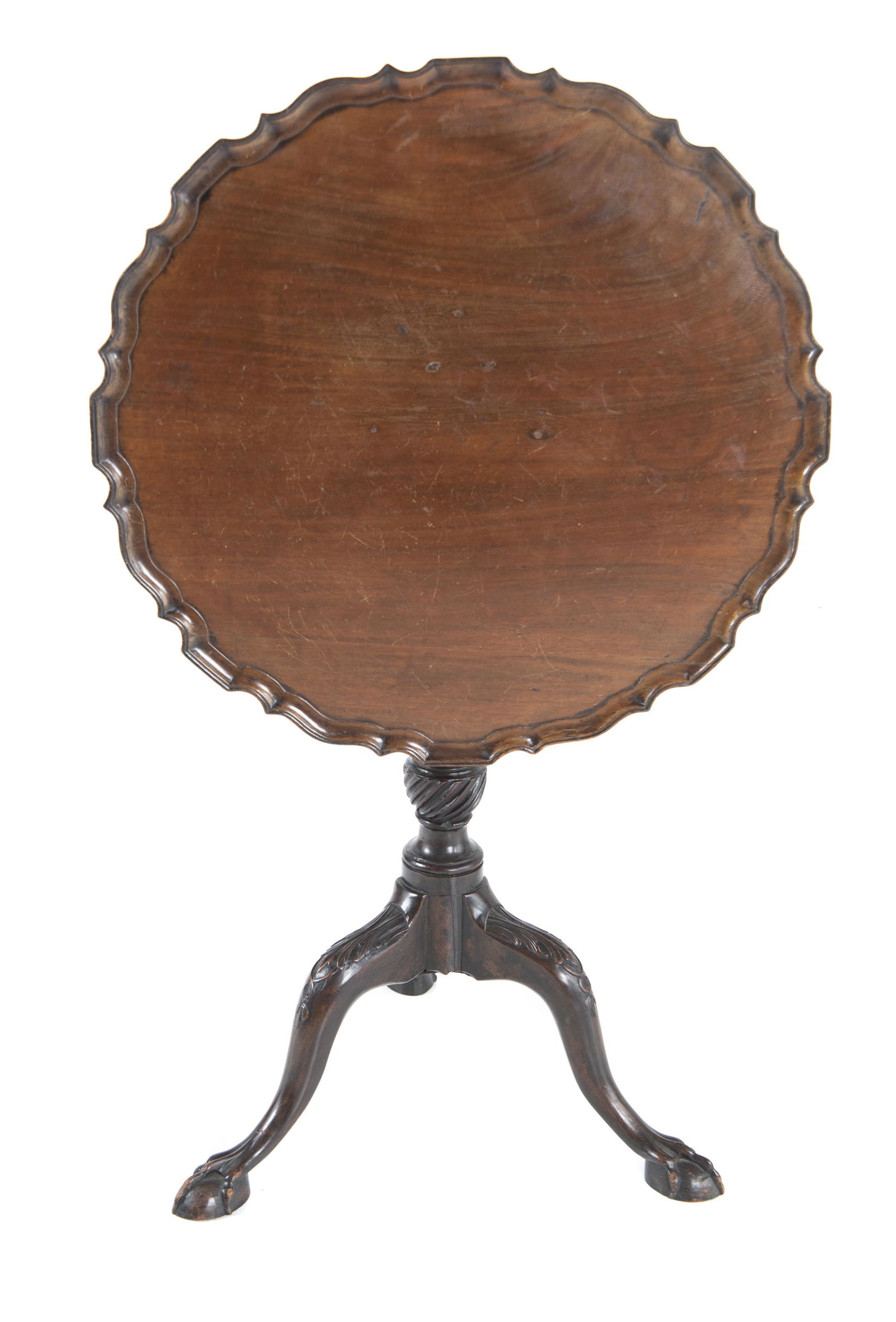 Mahogany Tea Table: DESCRIPTION: Mahogany tea table. With pie crust style rim and claw and ball feet. MEASUREMENTS: 25-1/2" diameter x 28-1/4" high. CONDITION: Light surface wear to table top.
