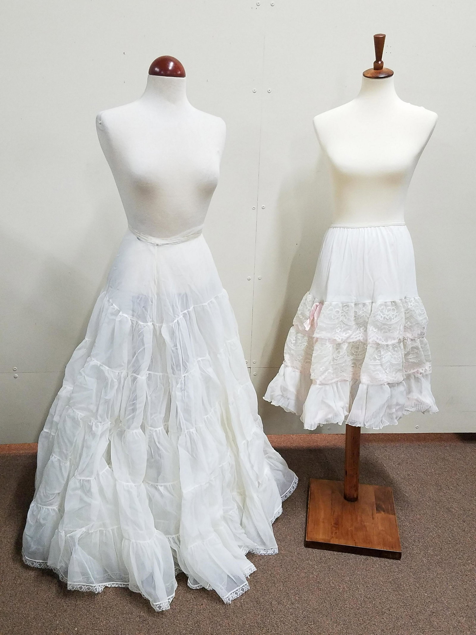 2 Antique Lace Crinolines: 27-3/4" to 42" long. Some staining and minor tears.