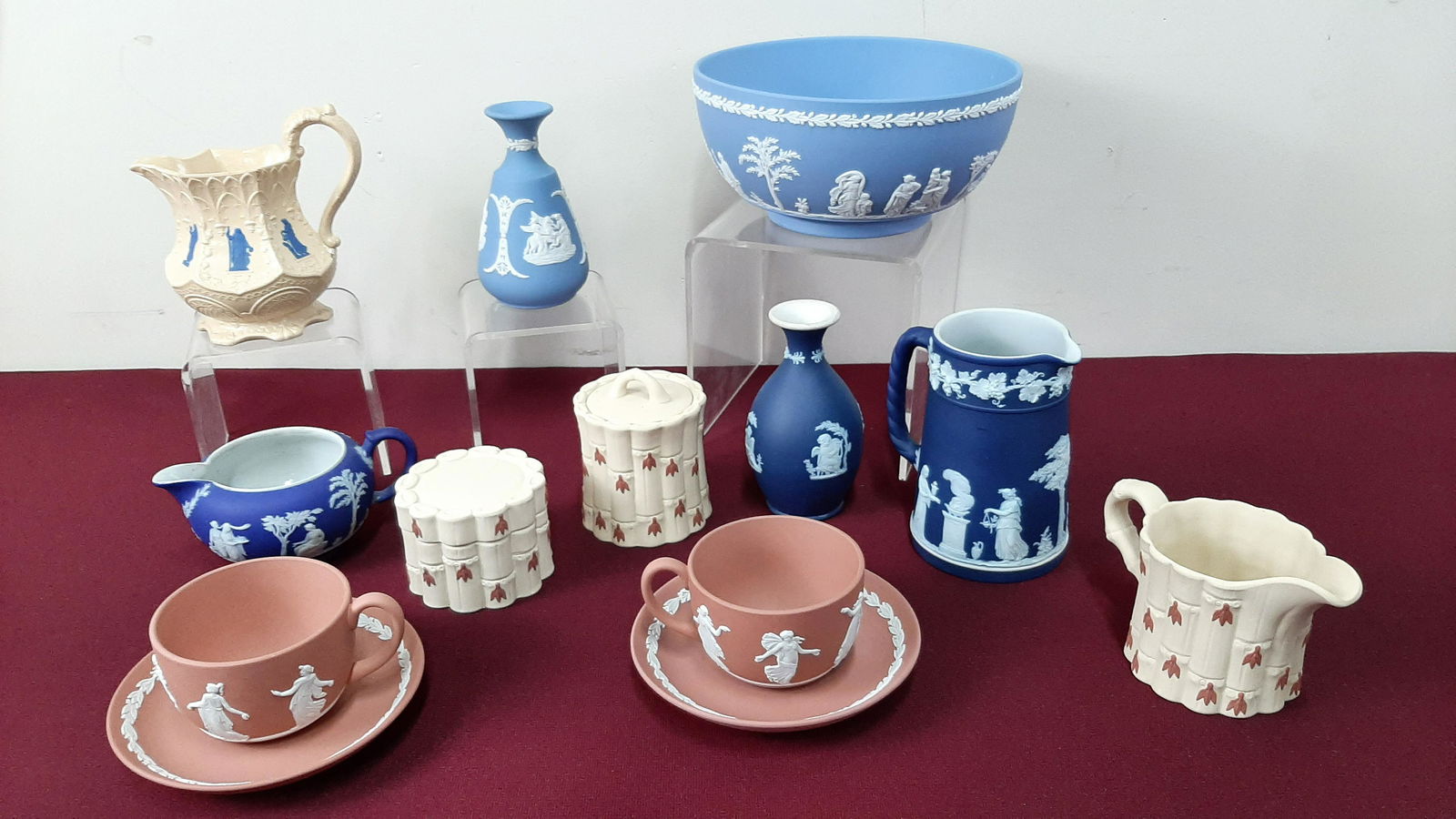 11 Wedgwood Ceramics: 2 1/2" to 5 1/2" high. Includes white on primrose coffee cup and saucer in original box.
