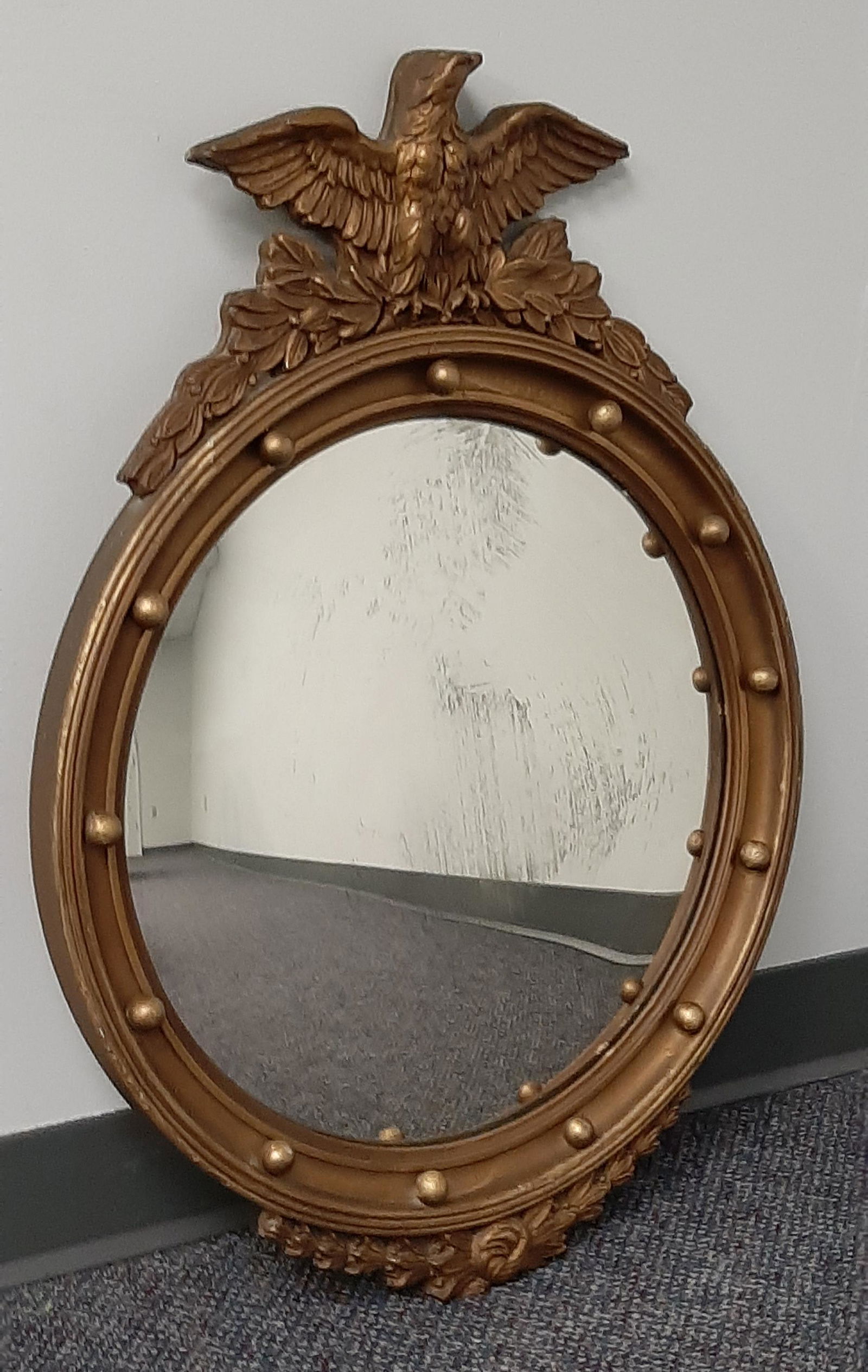 Eagle Crest Mirror: Overall with frame 21" wide X 28 1/2 high.Convex glass.