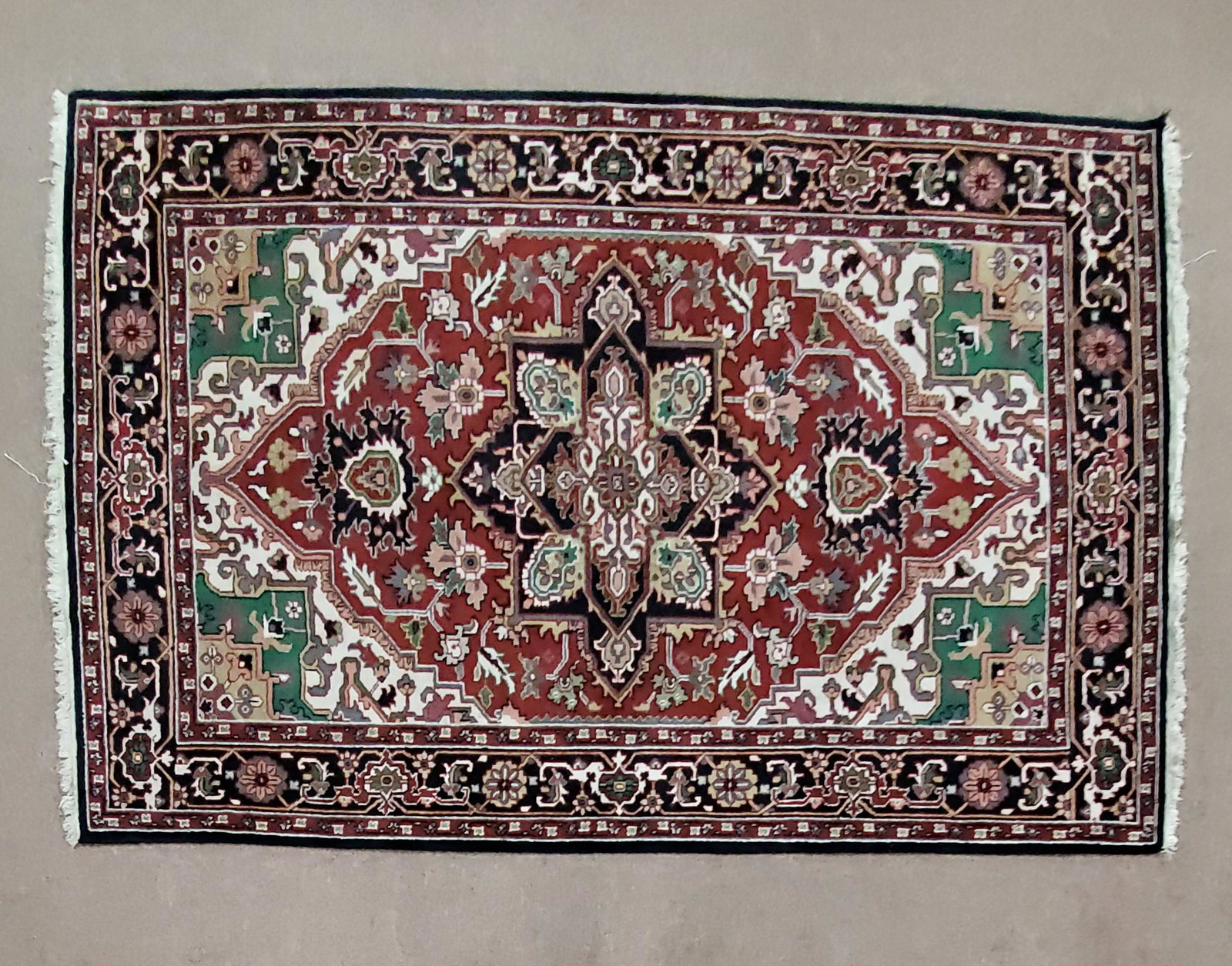Area Rug: Hand woven. 8'10" long x 6' 11" wide.