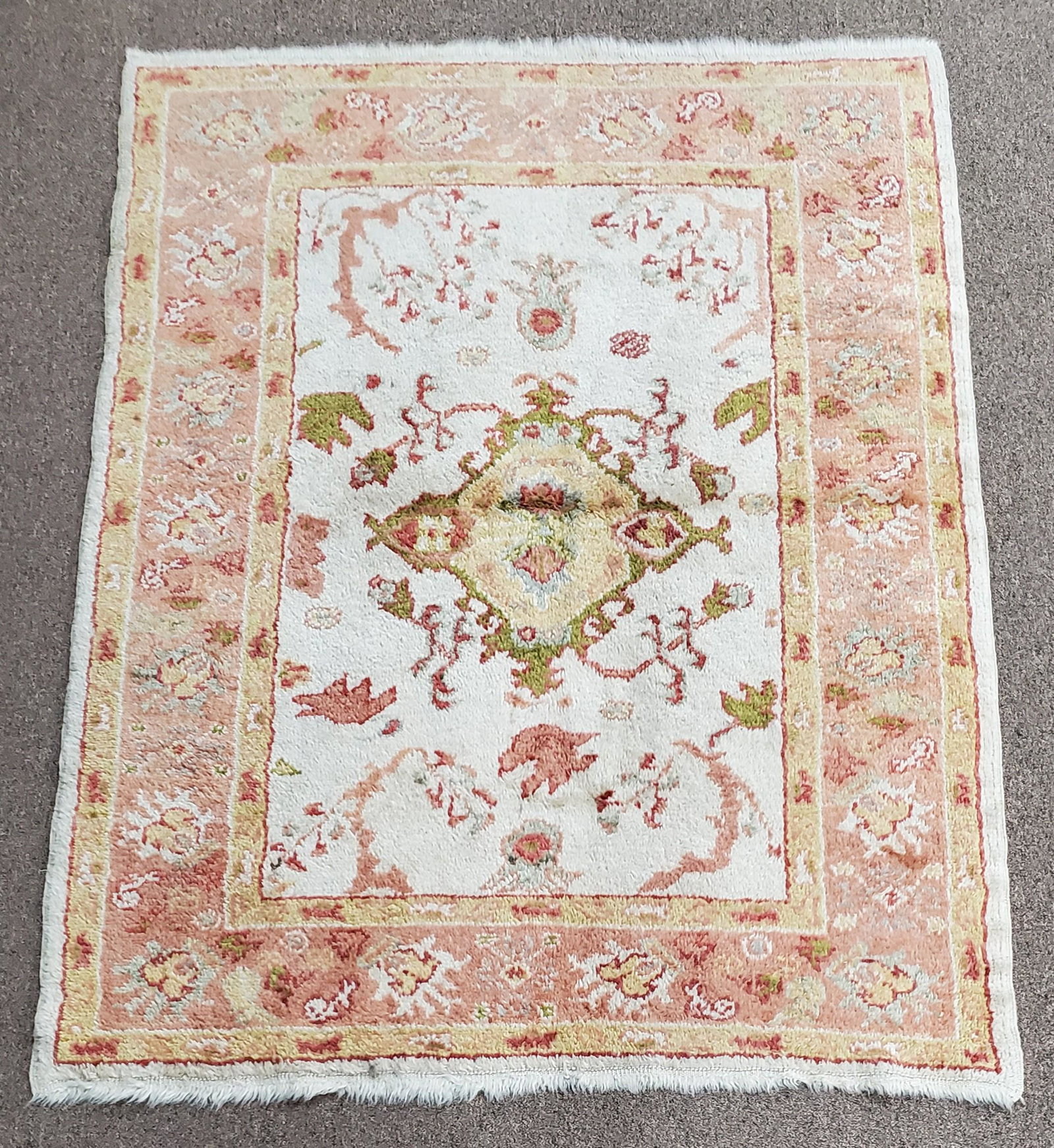 Area Rug: Hand woven. 5'5" long x 4'3" wide.