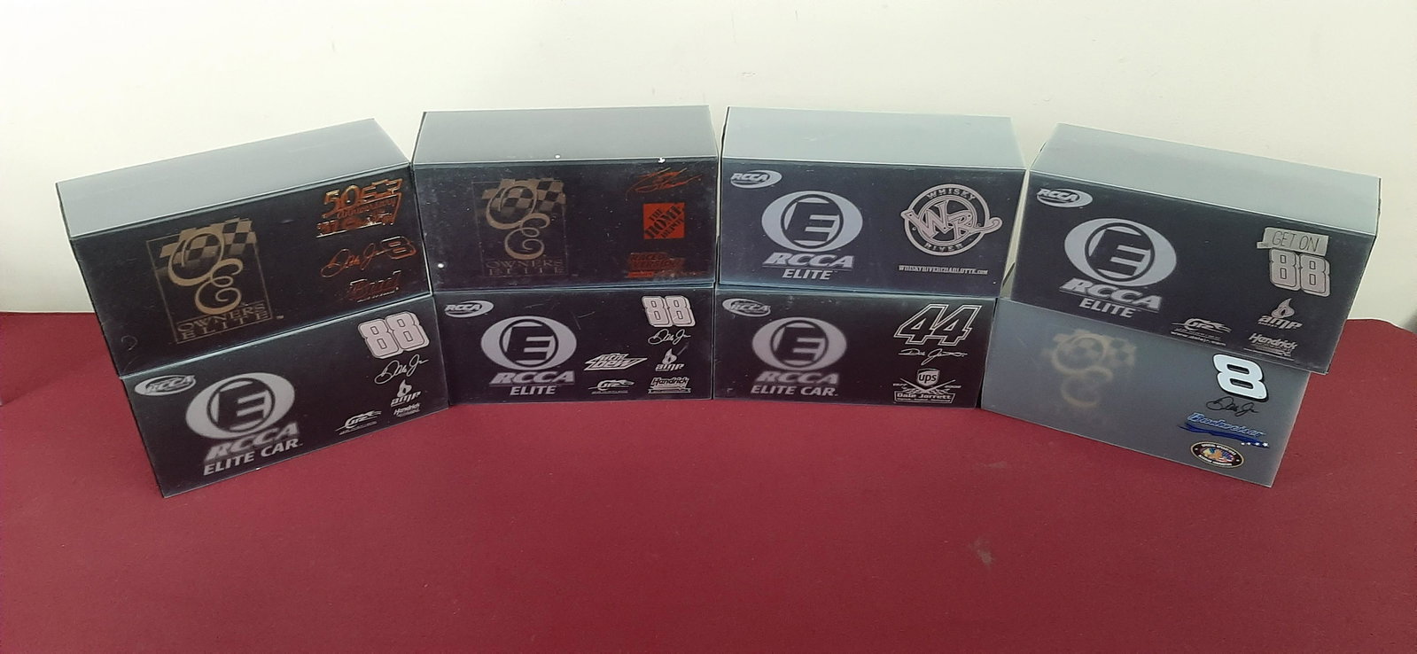 8 RCCA Elite Nascar Die Cast Cars: All 1:24 scale. Includes Dale Earnhardt Jr., Tony Stewart, and Dale Jarrett.