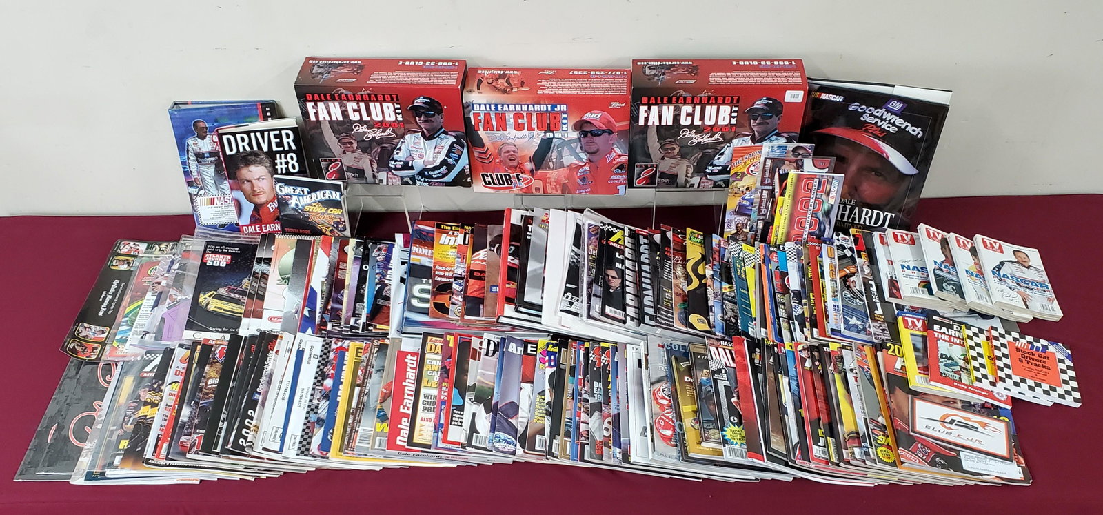 217 Pcs Nascar Ephemera and Apparel: Includes: Magazines, Calendars, Books and Clothing. Also includes Dale Earnhardt.