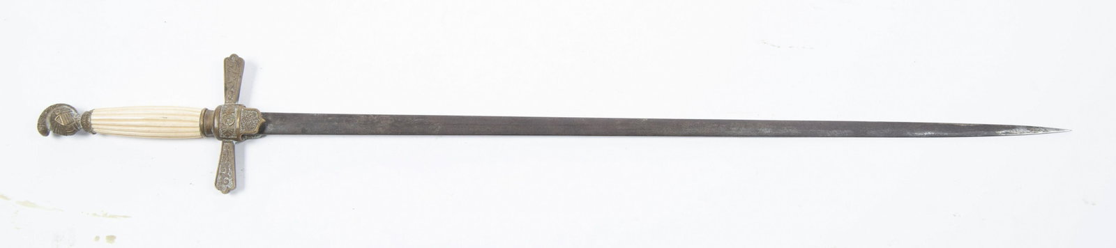 1850 Militia Sword: sword. Features fluted bone handle, with brass knights head pommel, brass cross guard with federal shield and elliptical blade. MEASUREMENTS: Blade 27". Overall length 33-1/2". CONDITION: Pitting to b