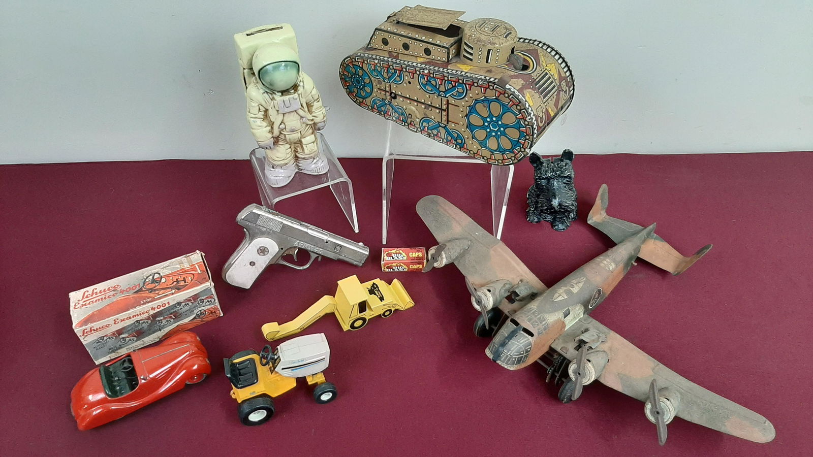 8 Vintage Toys Incl. Shuco and Marx: Also includes Cub Cadet, astronaut bank, and cap gun.