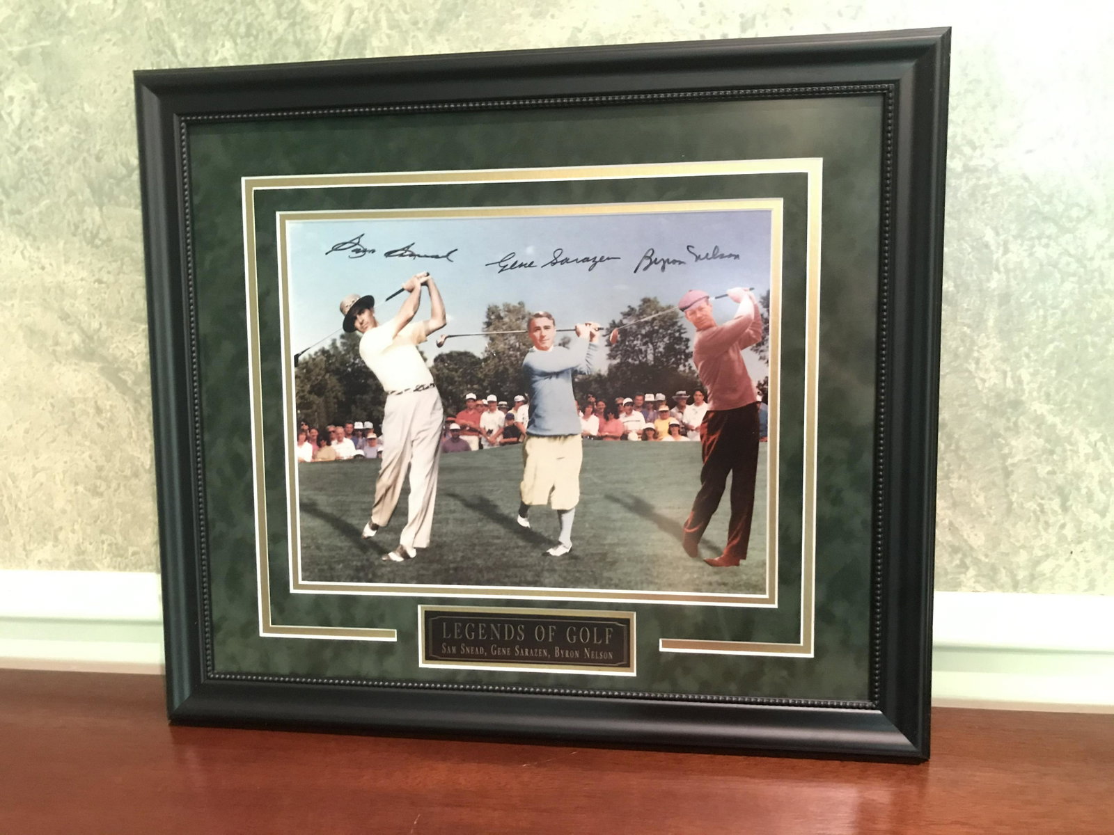 Sam Snead, Gene Sarazen, Byron Nelson: Signed Legends of Golf Display. 19-1/4” high x 22-1/4” wide.