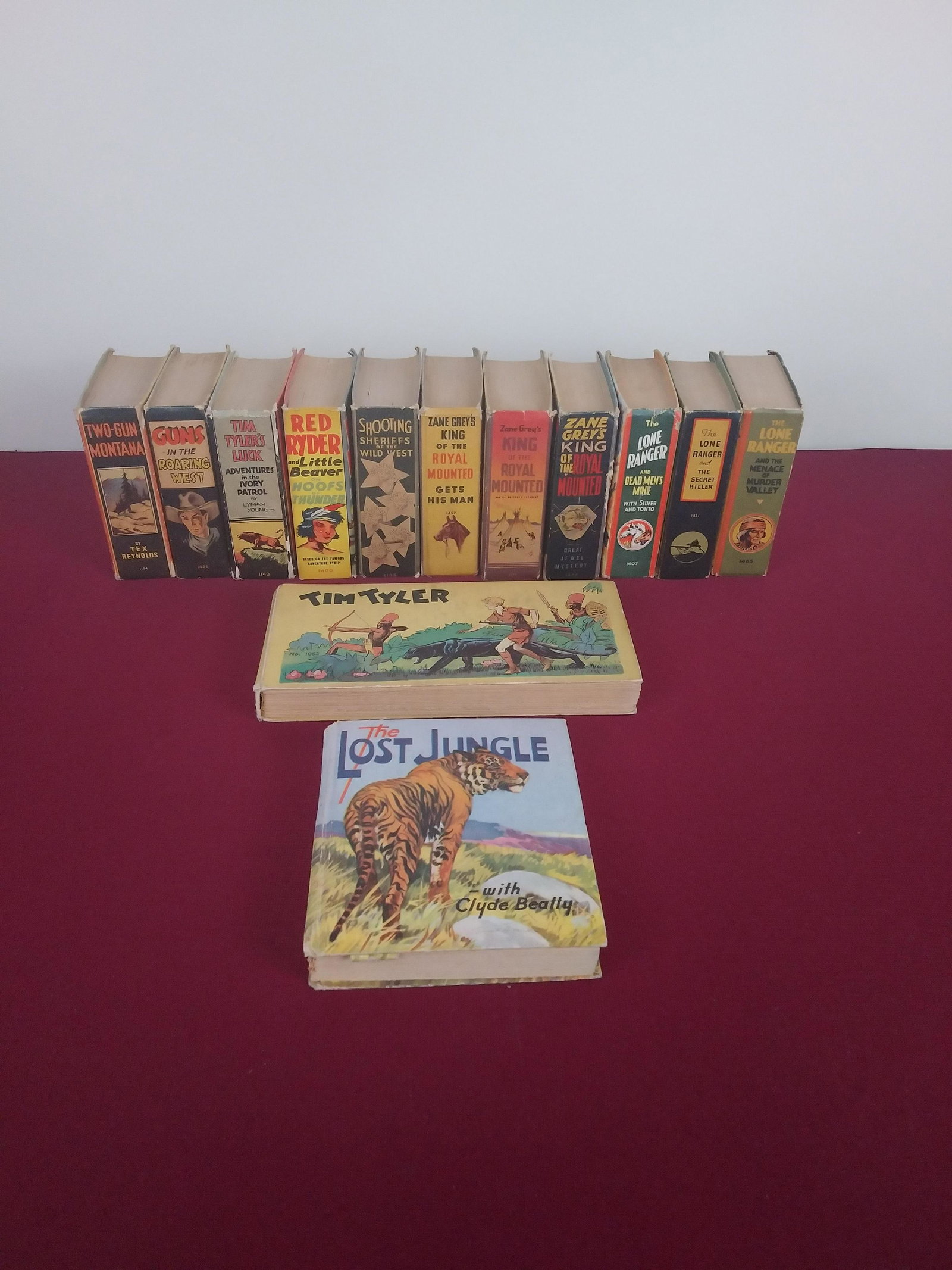 11 Big Little Books - Westerns And Adventure: Circa 1930s. Includes Tim Tyler, The Lone Ranger, Zane Grey, Two-Gun Montana, and The Lost Jungle. 3-1/2" x 4-1/2".