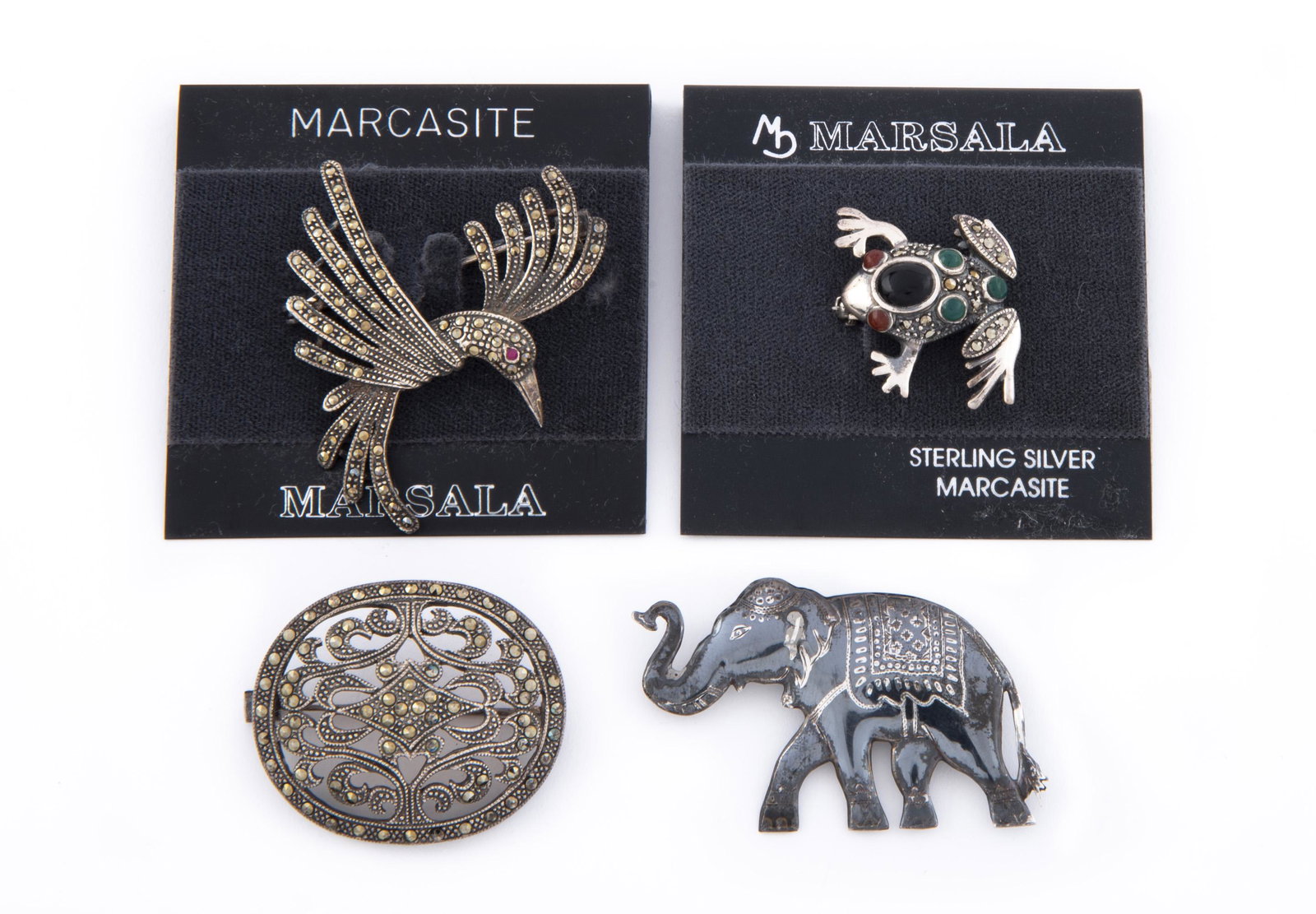 4 Silver Brooches: DESCRIPTION: Three Marsala marcasite brooches including hummingbird and frog. Siam elephant pin.