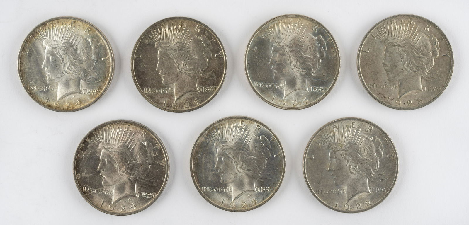 7 U. S. Peace Silver Dollars (1 of 2)