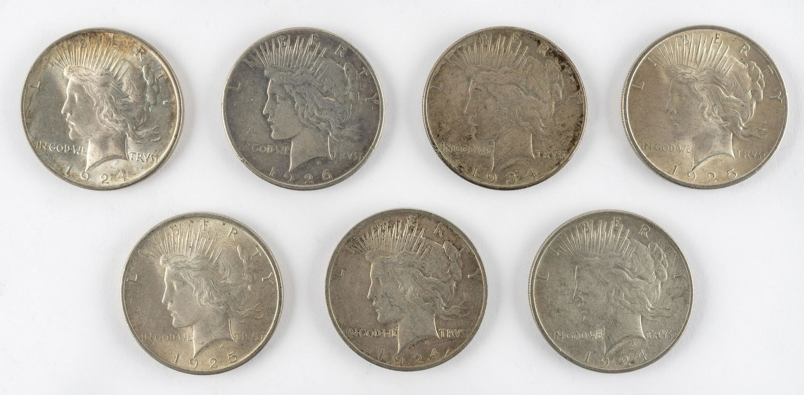 7 U. S. Peace Silver Dollars (1 of 2)
