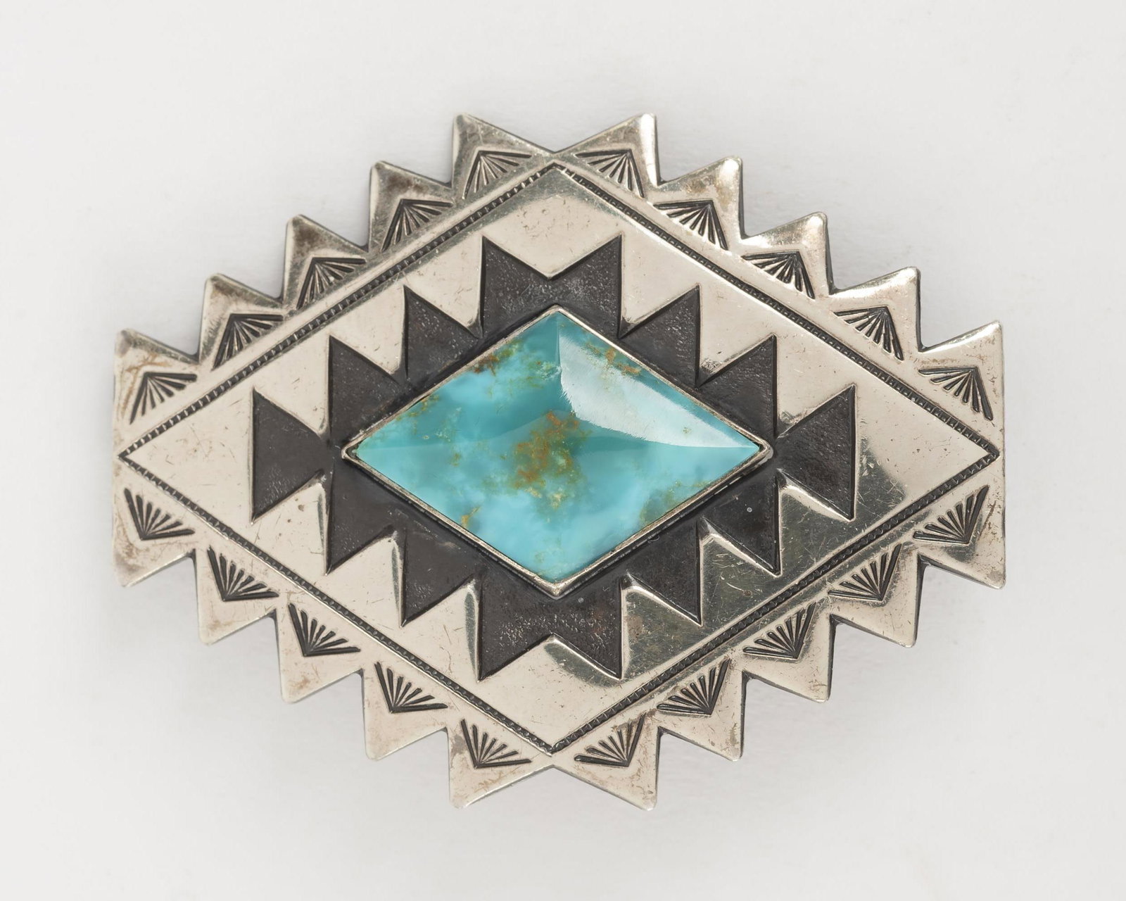 Bell Trading Post Silver And Turquoise Brooch: With Bell Trading Post and "Sterling" marks. 1-3/4" x 1-1/2".