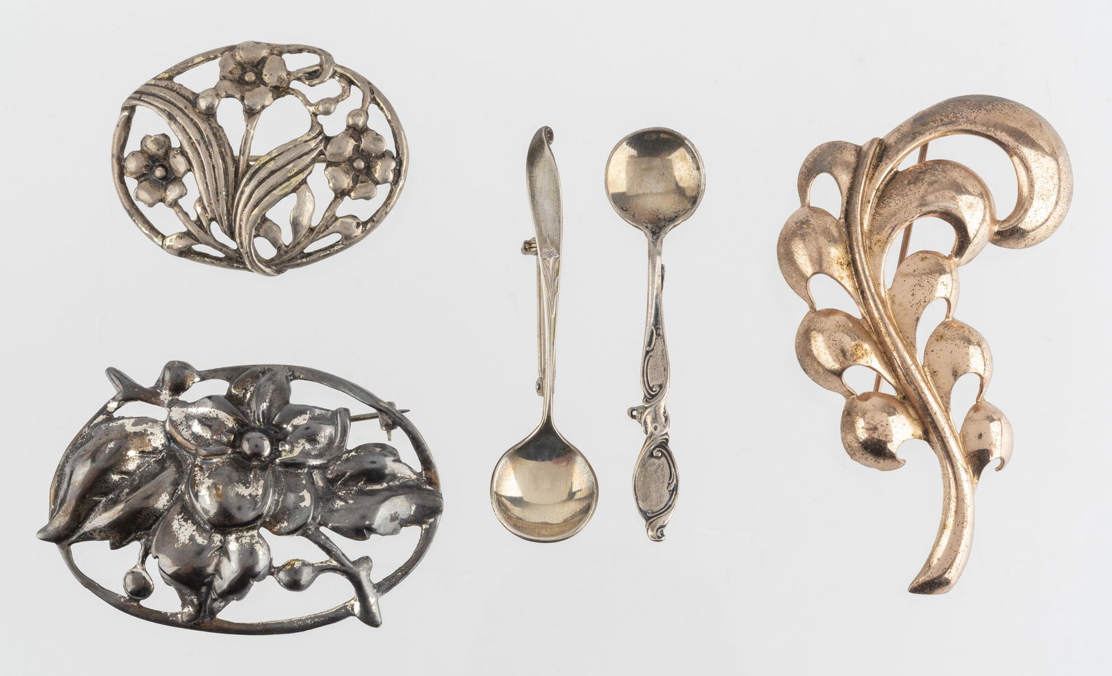 5 Sterling Pins: Including floral, Monet leaf, and salt spoons. 1-3/4" to 3" wide.