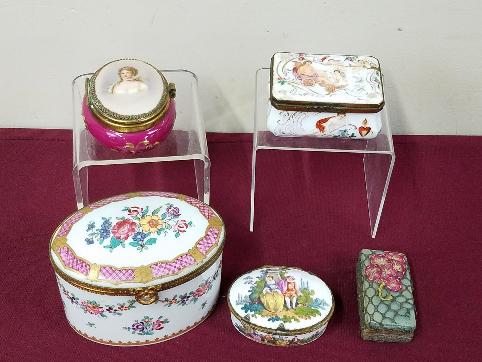 5 Snuff and Dresser Boxes: 2-3/4" to 4-3/4" wide x 1" to 3-3/4" high. Upper right boys with repaired lid. Bottom center portrait box detached at hinge.