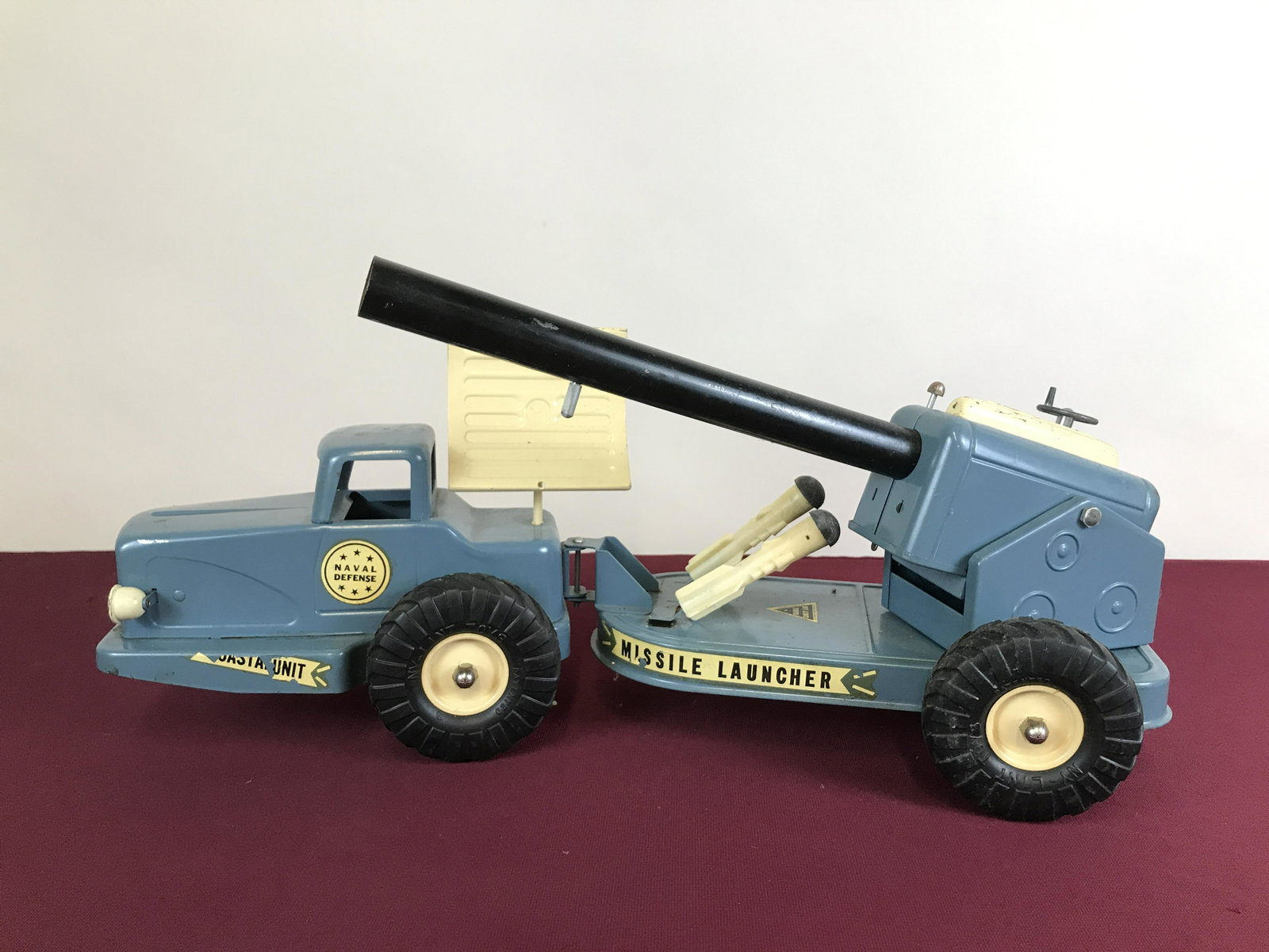 Ny-Lint Coastal Unit Missile Launcher: 21" long. Missing one missile. Launcher raises and lowers.