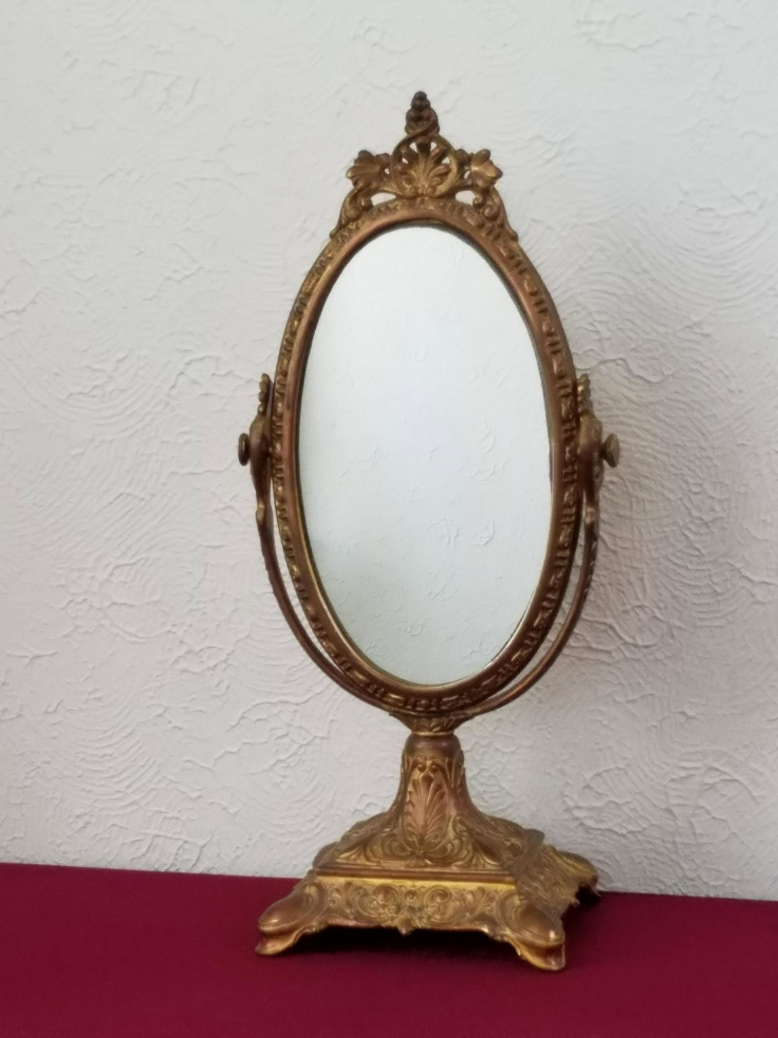 Gilt Table Mirror: 8-1/2" wide x 18-1/2" high. IMPORTANT: Before bidding, please read the terms and conditions below. When you registered for the auction you agreed to these terms and will be required to comply with the